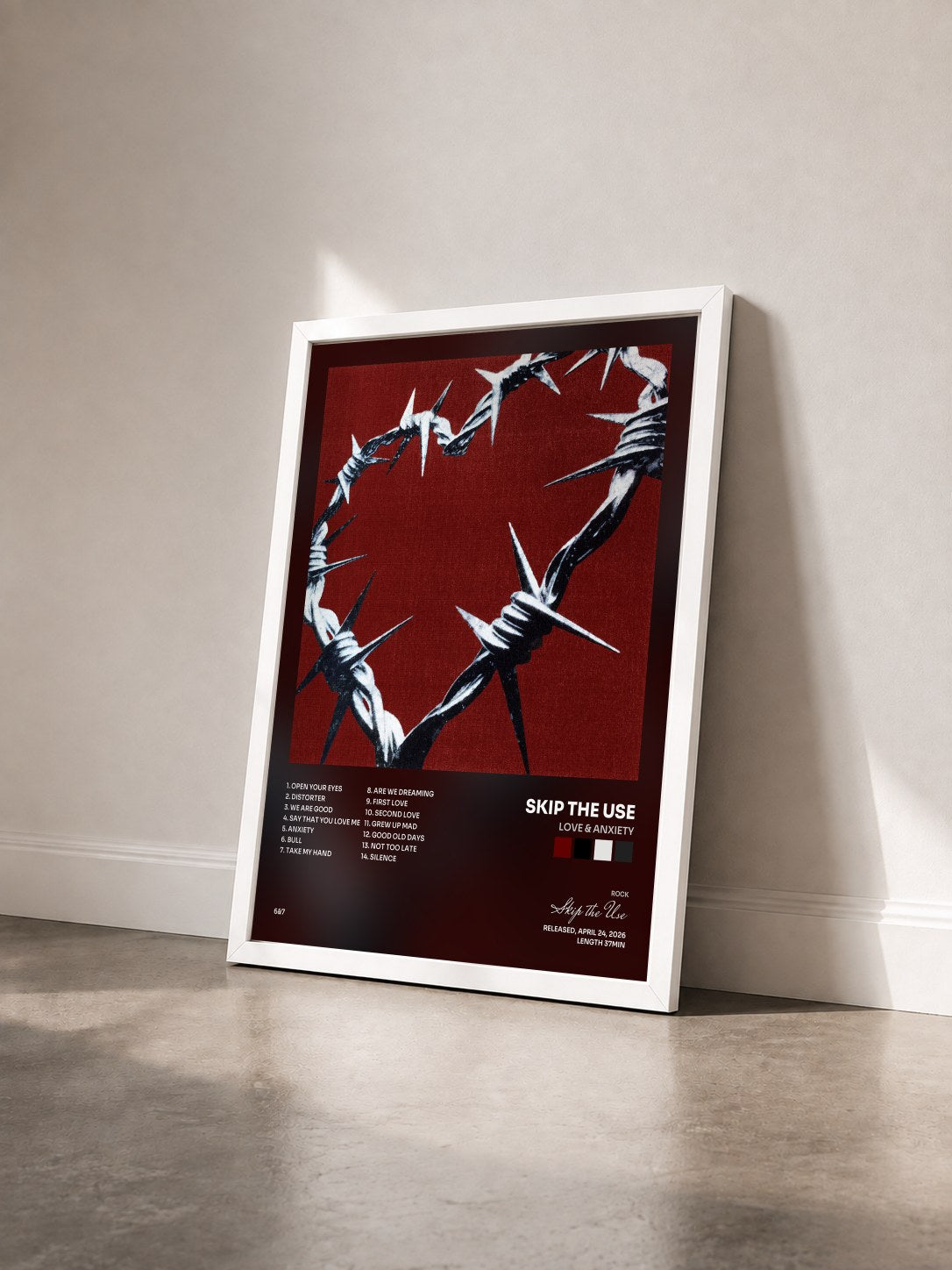 #blanc Tableau de l'album LOVE & ANXIETY de Skip the Use vu de trois quarts, cadre blanc
