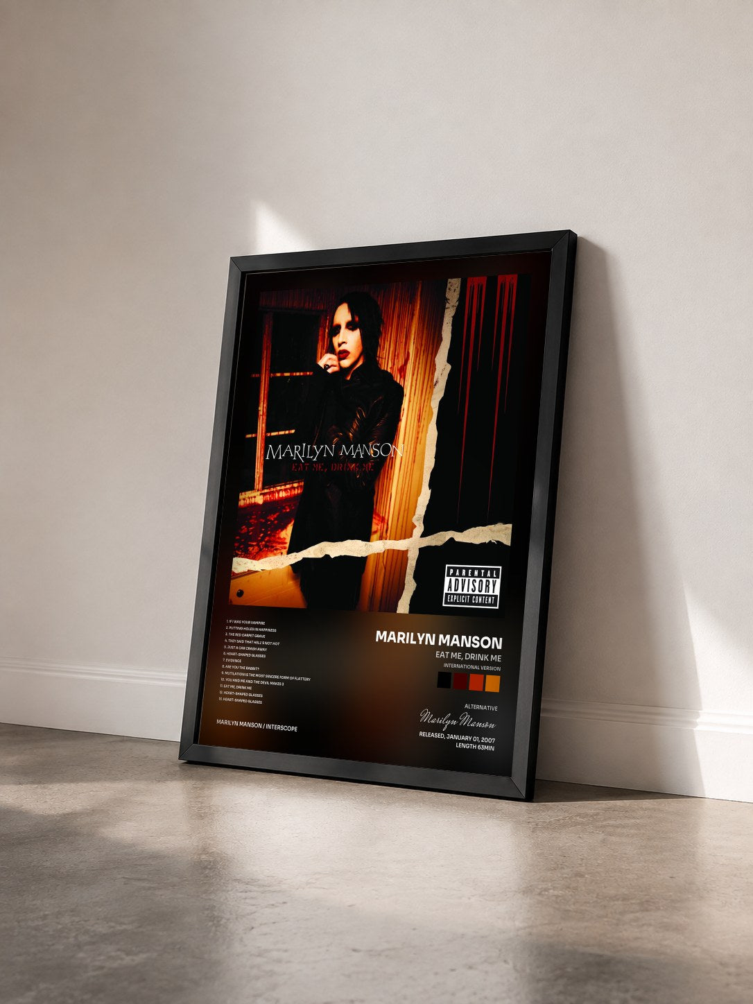 #noir Tableau de l'album EAT ME, DRINK ME (International Version) de Marilyn Manson vu de trois quarts, cadre noir