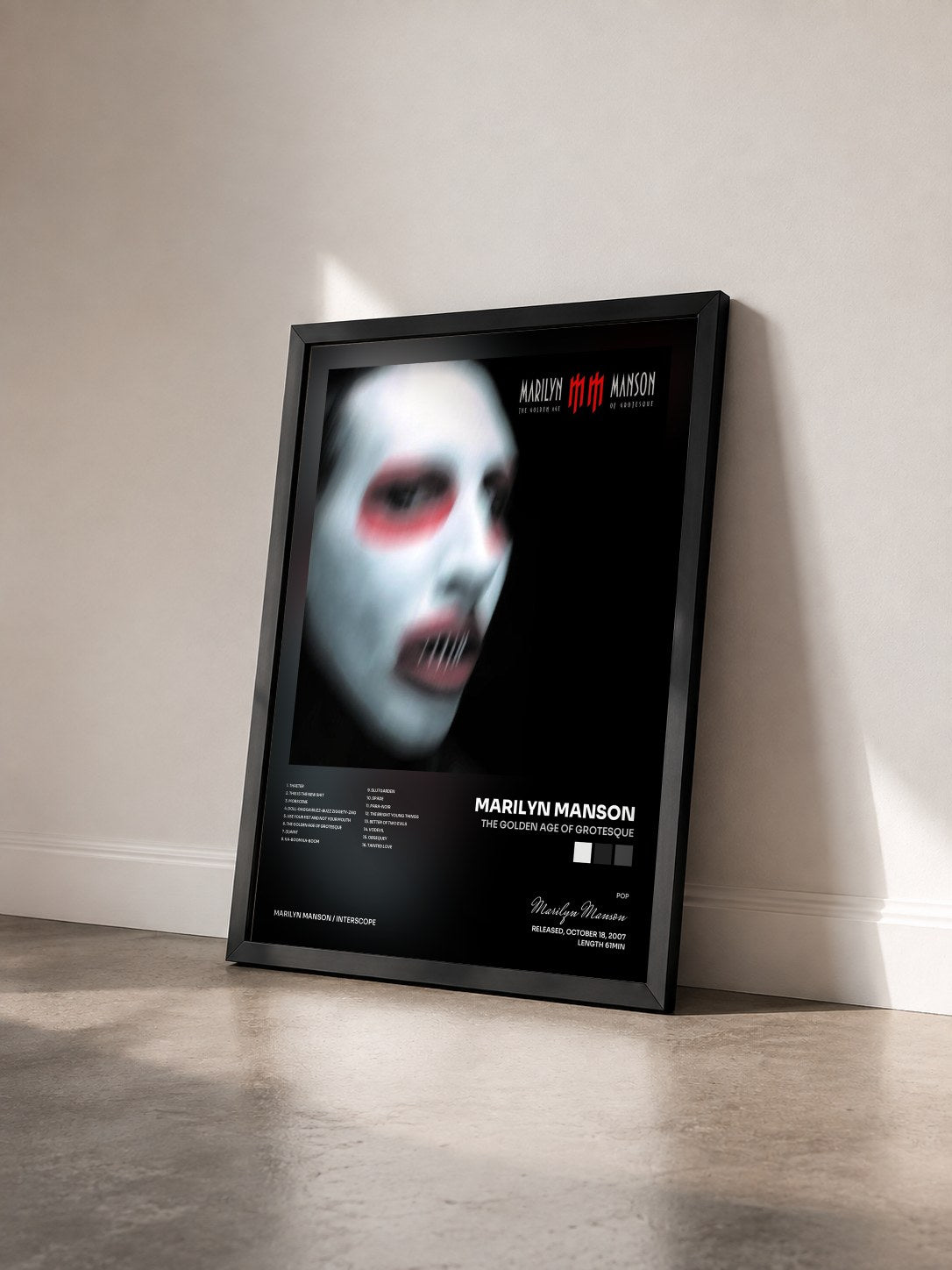 #noir Tableau de l'album The Golden Age Of Grotesque de Marilyn Manson vu de trois quarts, cadre noir