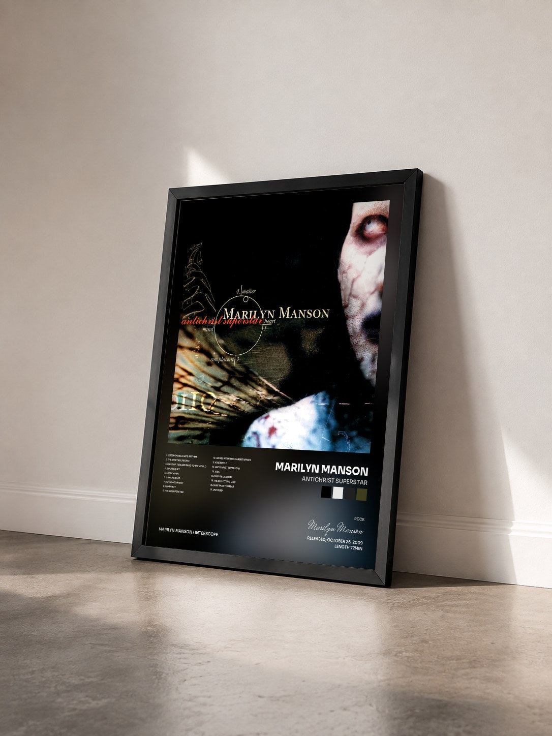 #noir Tableau de l'album Antichrist Superstar de Marilyn Manson vu de trois quarts, cadre noir