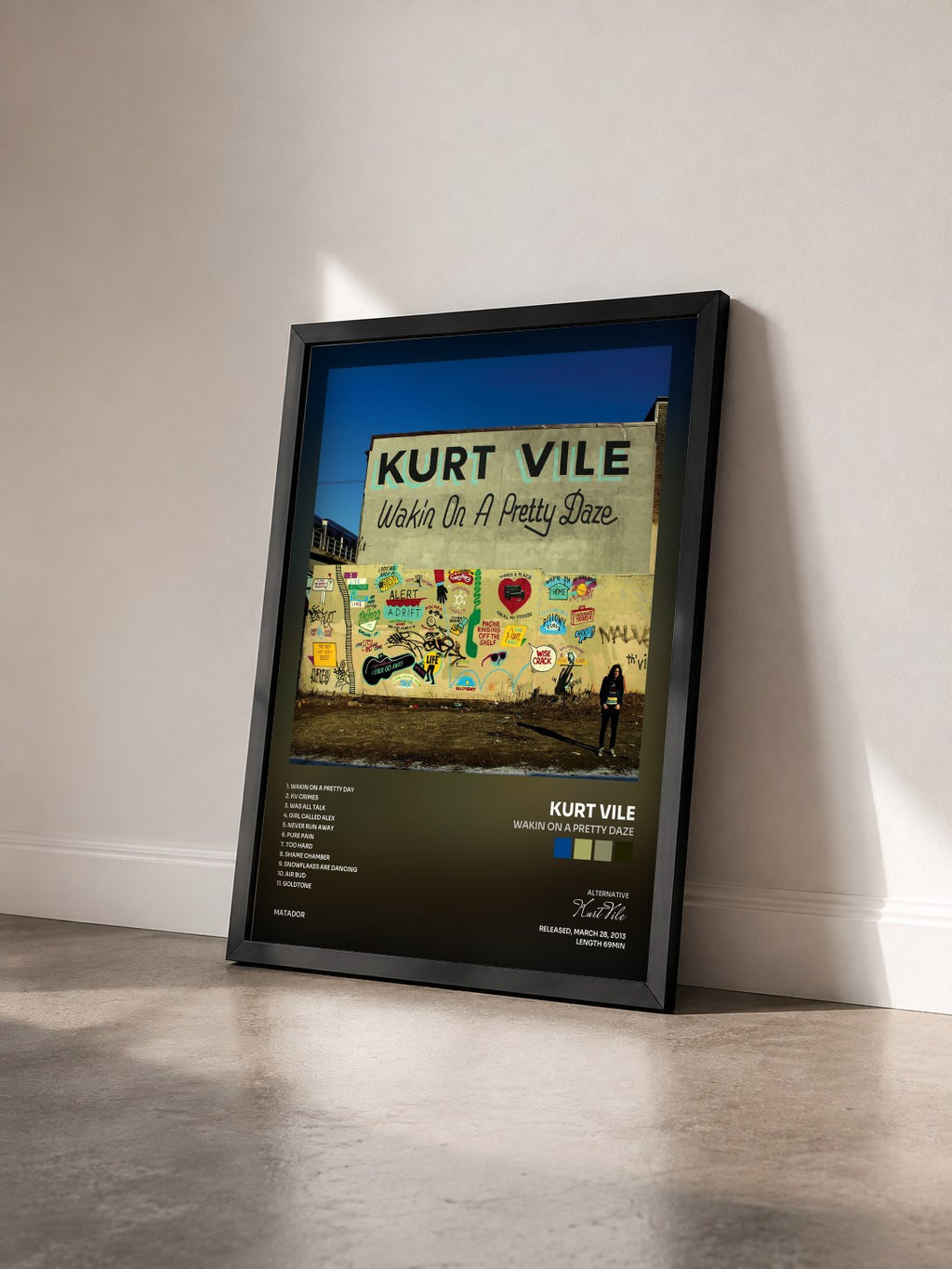 #noir Tableau de l'album Wakin On A Pretty Daze de Kurt Vile vu de trois quarts, cadre noir