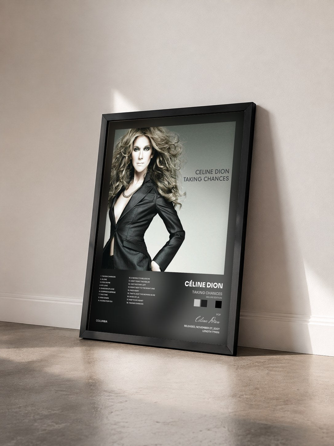 #noir Tableau de l'album Taking Chances (Deluxe Edition) de Céline Dion vu de trois quarts, cadre noir