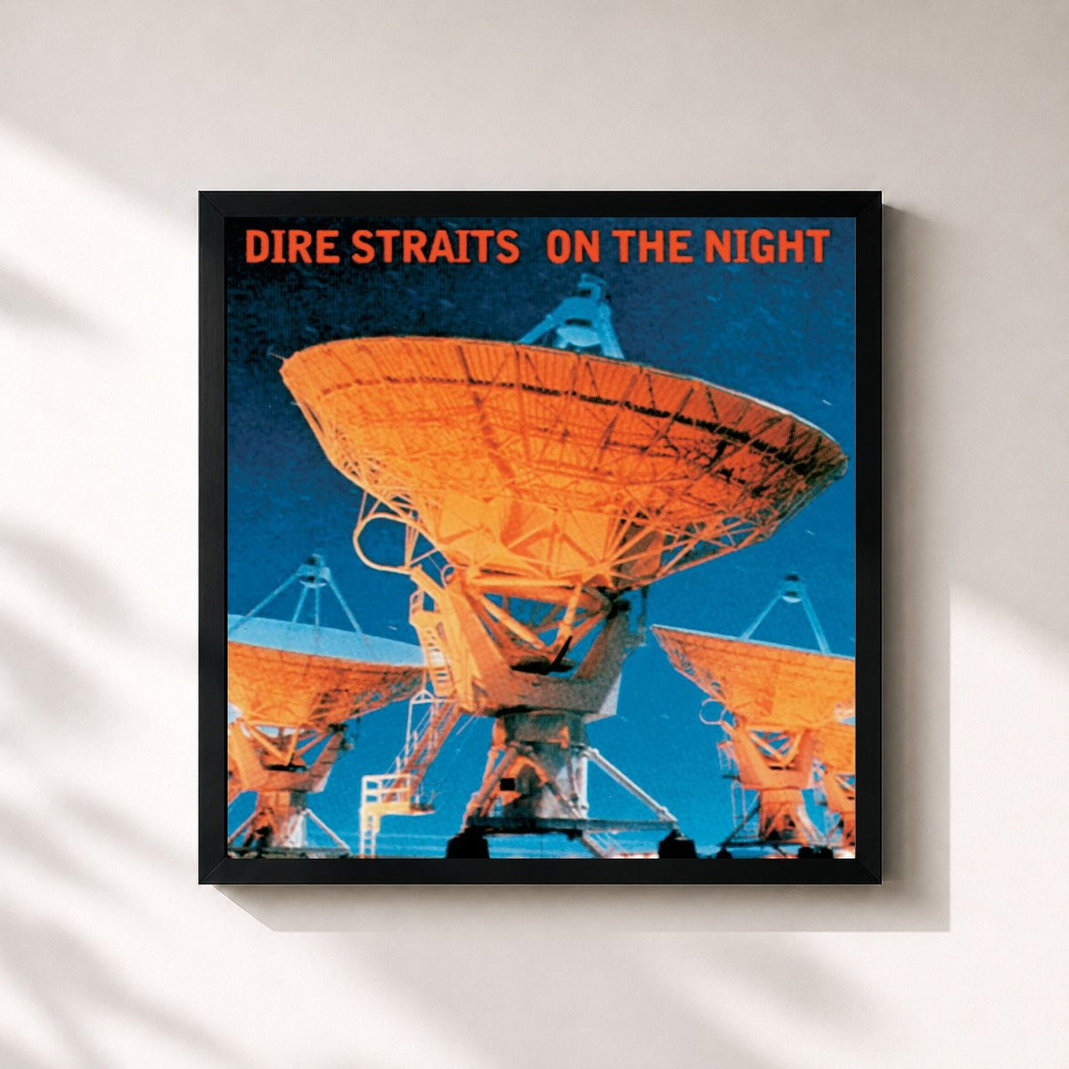 #noir On The Night de Dire Straits en lámina cuadrada enmarcada, marco negro de 32x32 cm
