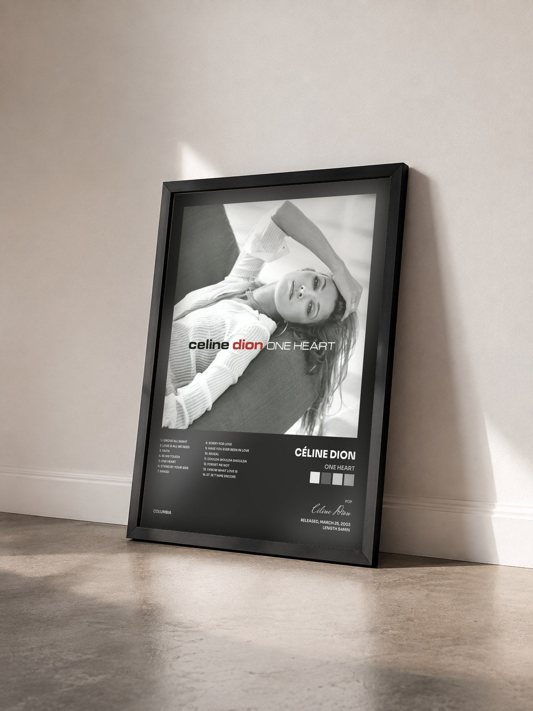 #noir Tableau de l'album One Heart de Céline Dion vu de trois quarts, cadre noir