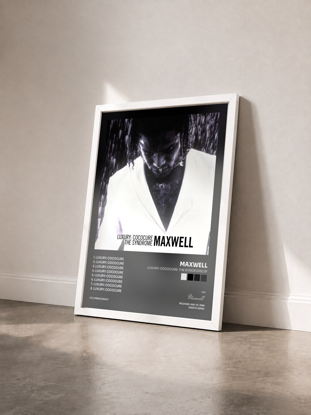 #blanc Tableau de l'album Luxury: Cococure: The Syndrome EP de Maxwell vu de trois quarts, cadre blanc
