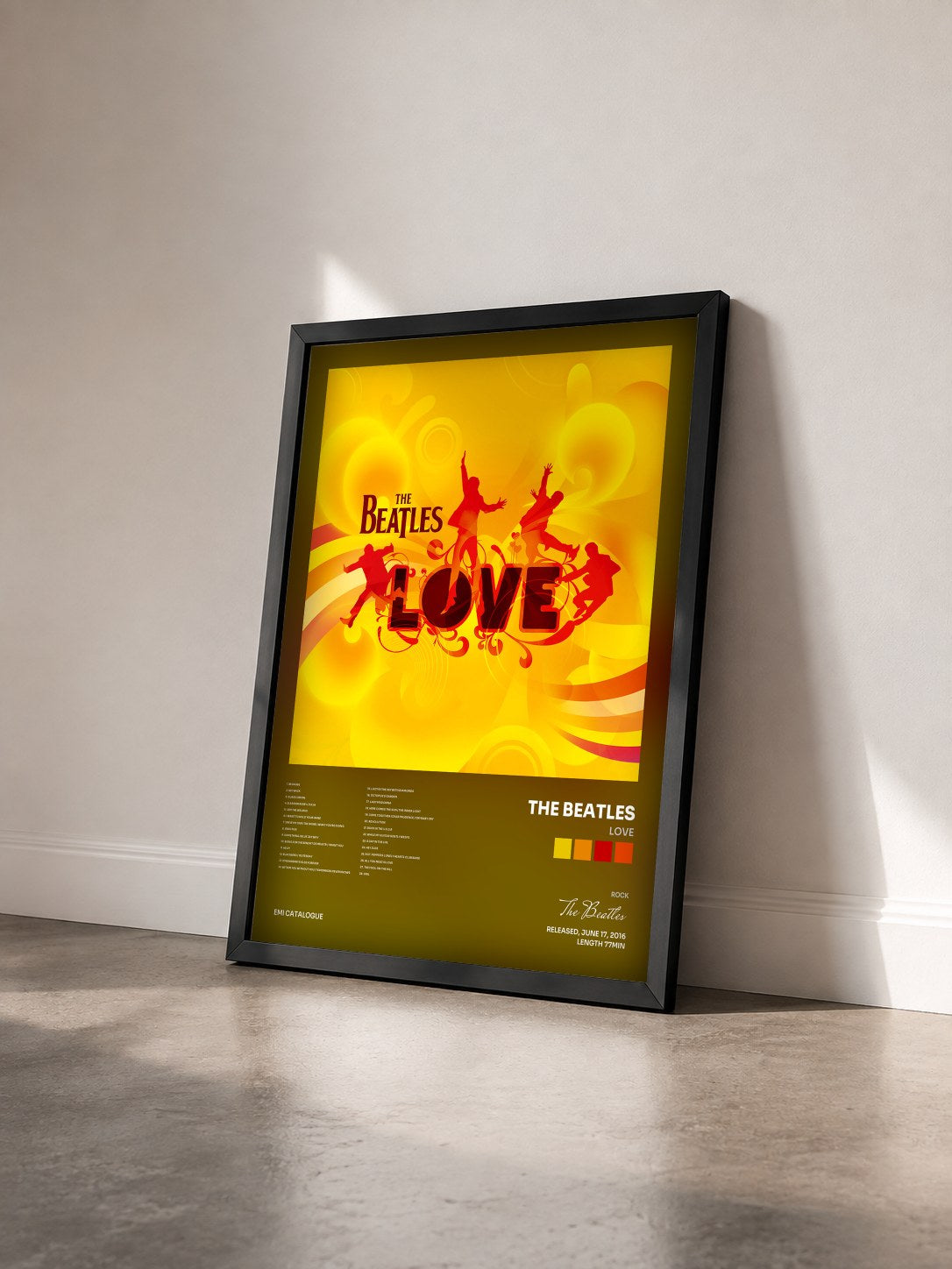#noir Tableau de l'album Love de The Beatles vu de trois quarts, cadre noir
