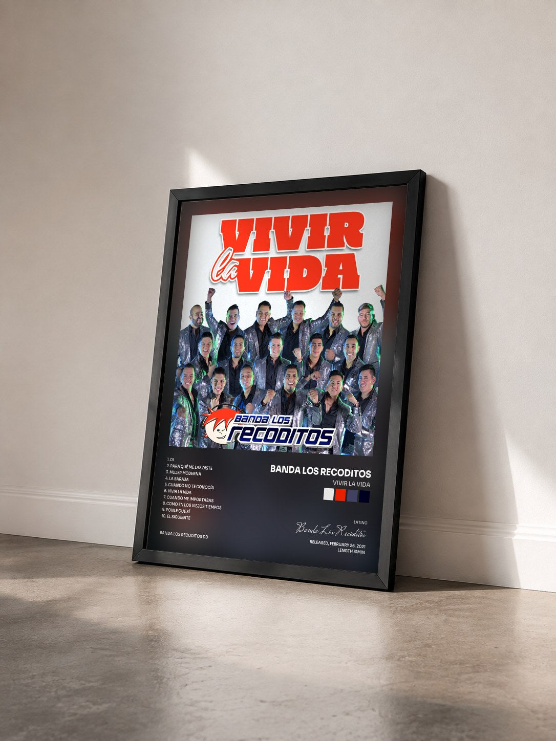 #noir Tableau de l'album Vivir La Vida de Banda Los Recoditos vu de trois quarts, cadre noir