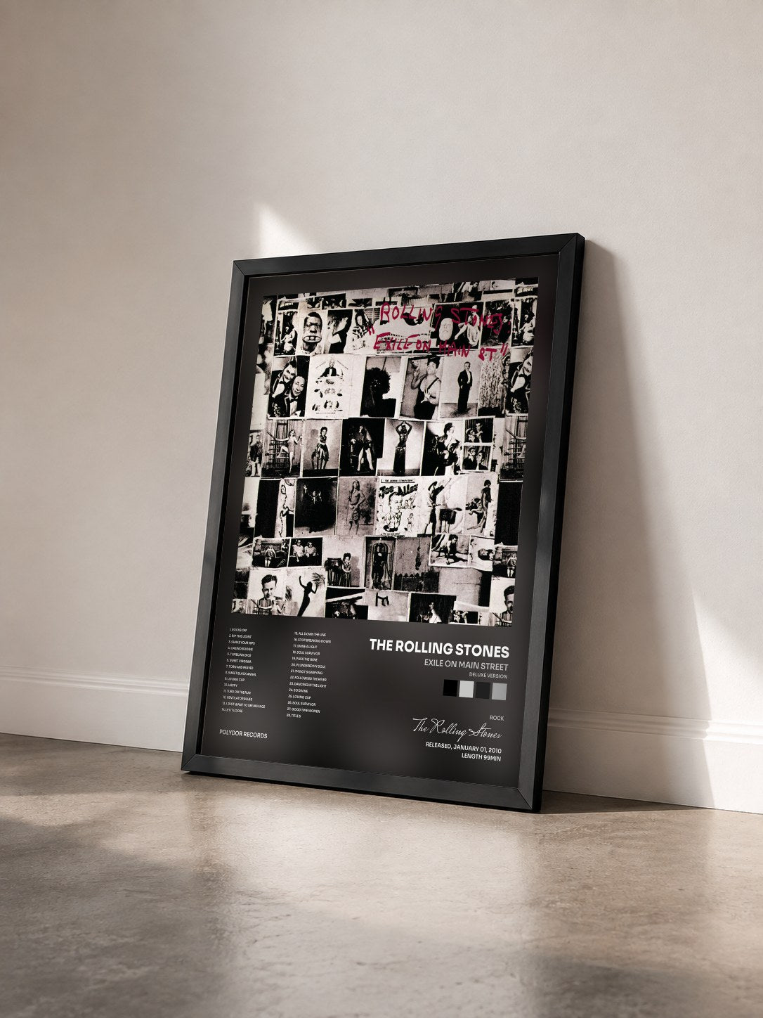 #noir Tableau de l'album Exile On Main Street (Deluxe Version) de The Rolling Stones vu de trois quarts, cadre noir