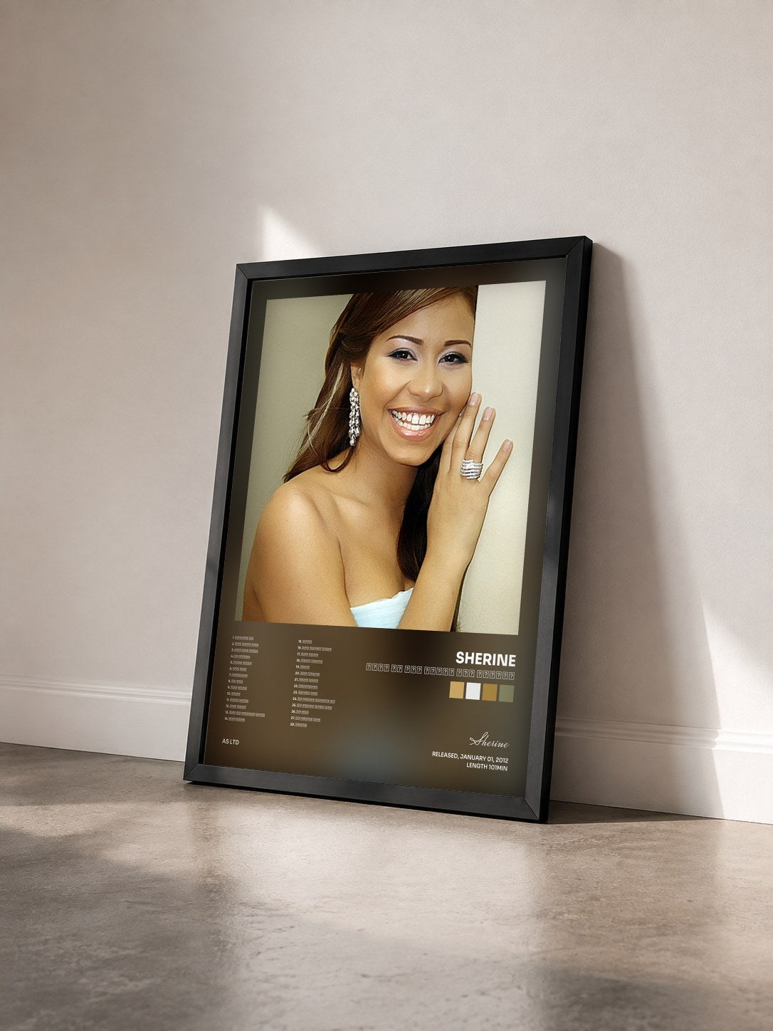 #noir Tableau de l'album احلي ما غنت شيرين عبد الوهاب de Sherine vu de trois quarts, cadre noir