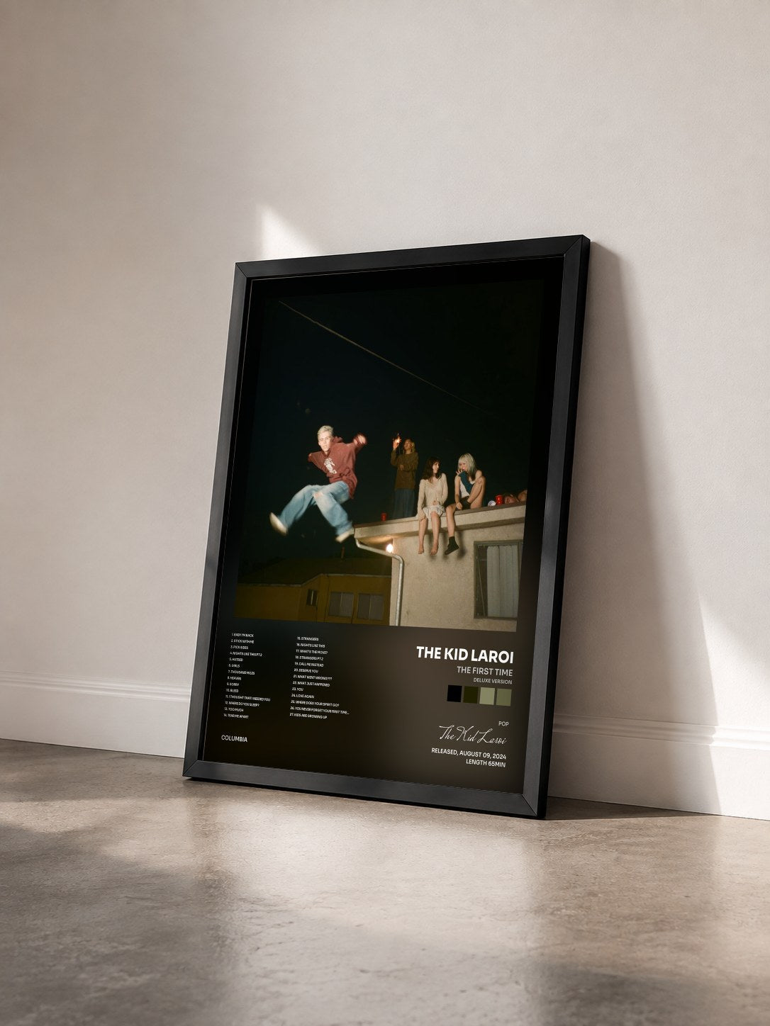 #noir THE FIRST TIME (DELUXE VERSION) by The Kid Laroi as a framed art print seen at an angle, black frame