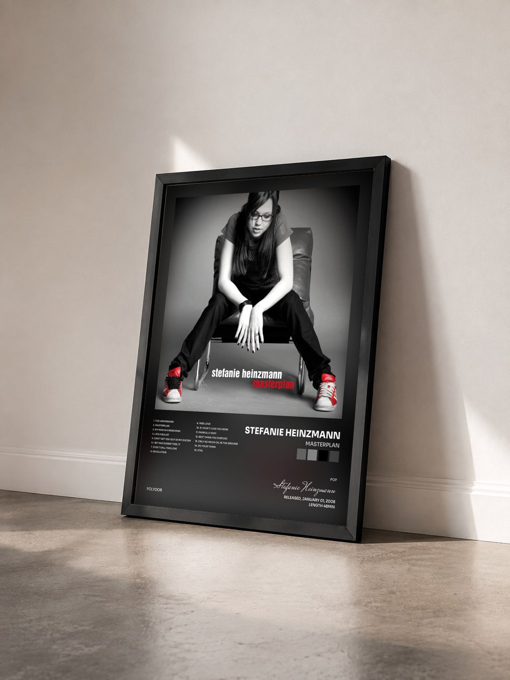 #noir Tableau de l'album Masterplan de Stefanie Heinzmann vu de trois quarts, cadre noir