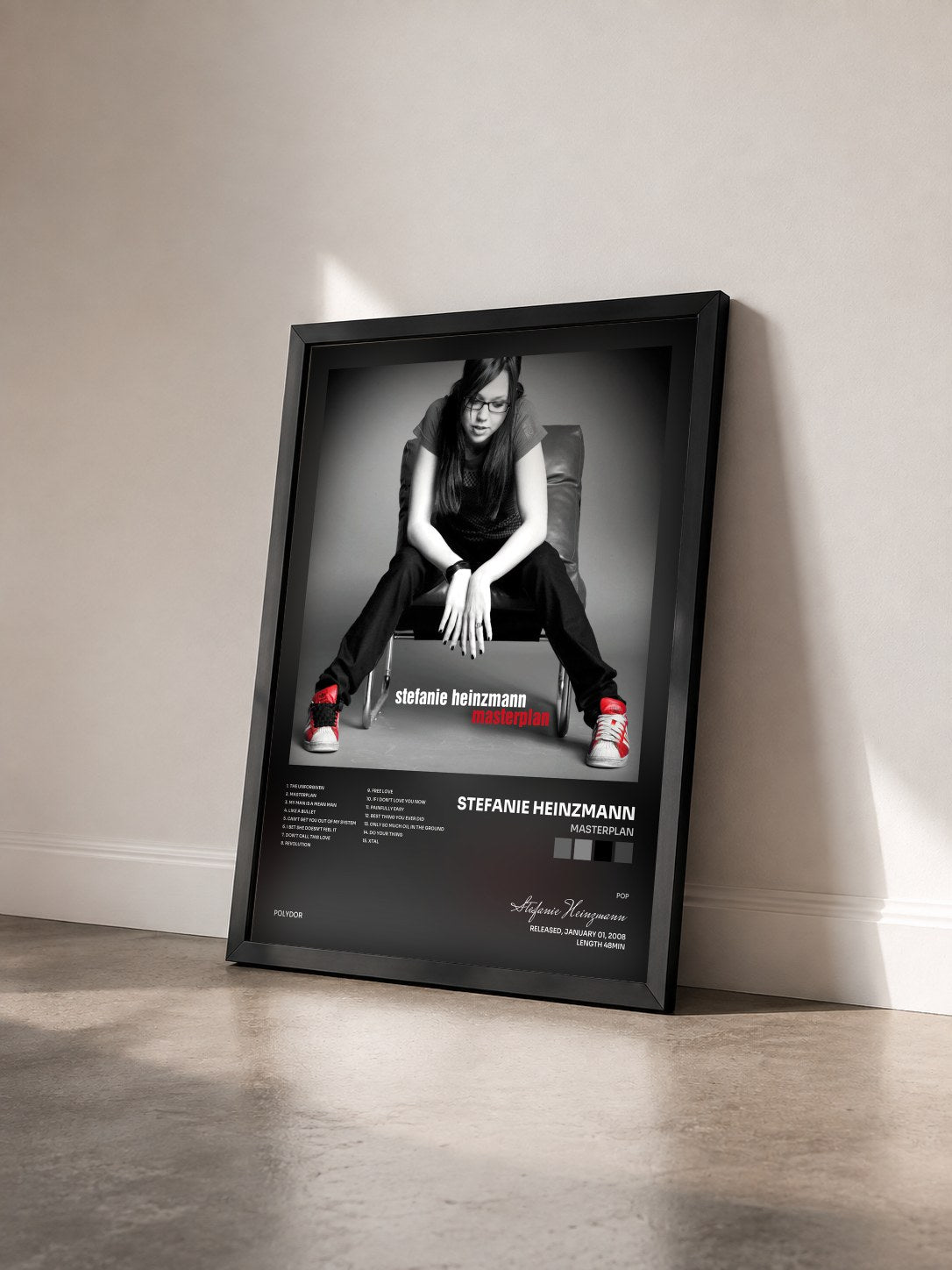 #noir Tableau de l'album Masterplan de Stefanie Heinzmann vu de trois quarts, cadre noir