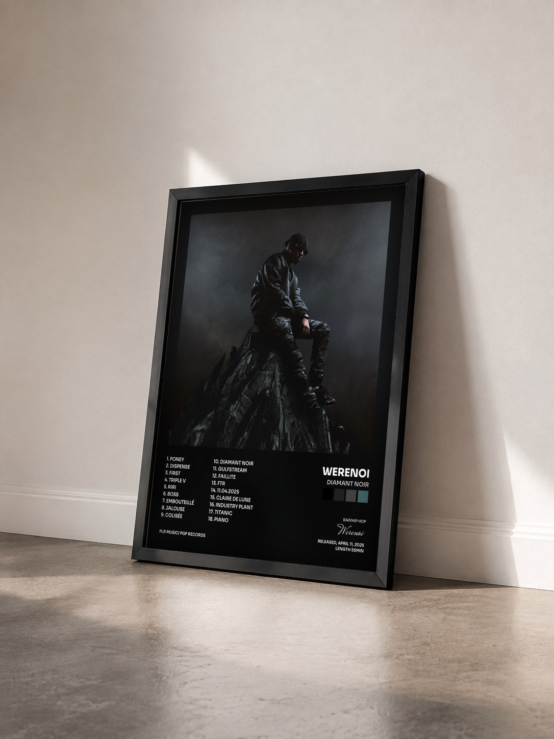 #noir Tableau de l'album Diamant Noir de Werenoi vu de trois quarts, cadre noir