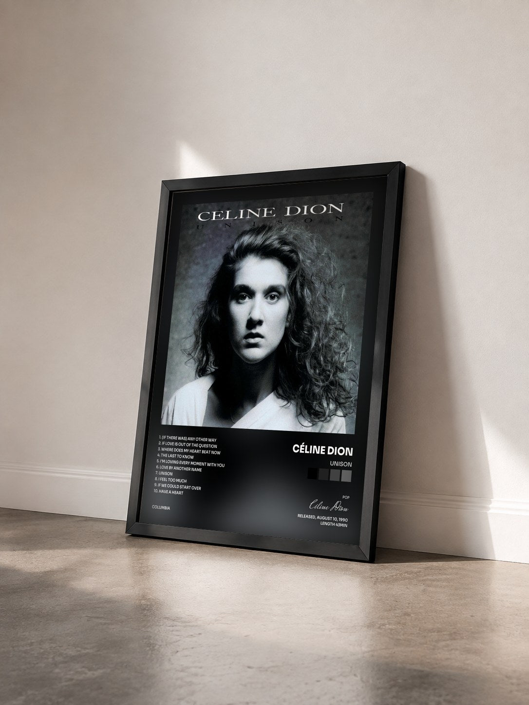 #noir Tableau de l'album Unison de Céline Dion vu de trois quarts, cadre noir