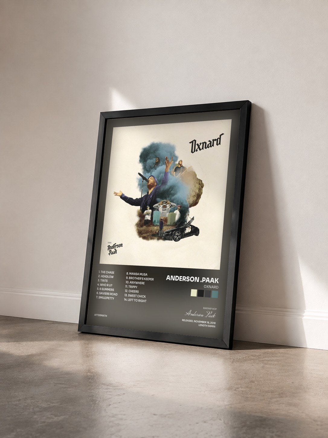 #noir Tableau de l'album Oxnard de Anderson .Paak vu de trois quarts, cadre noir