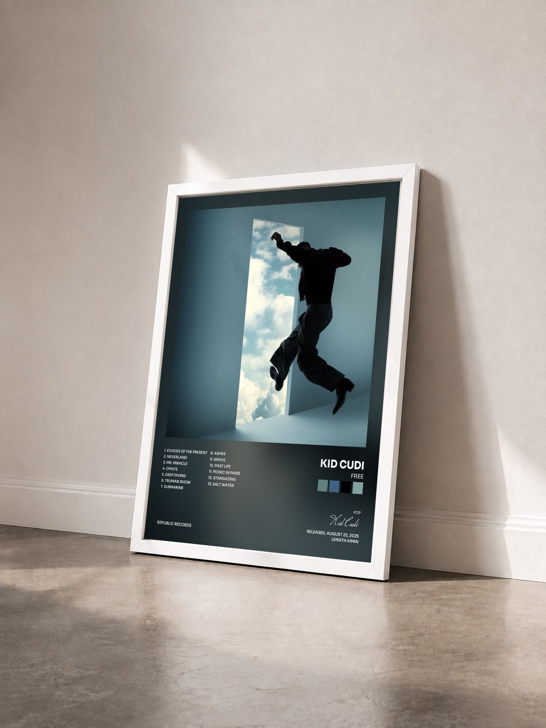 #blanc Tableau de l'album Free de Kid Cudi vu de trois quarts, cadre blanc