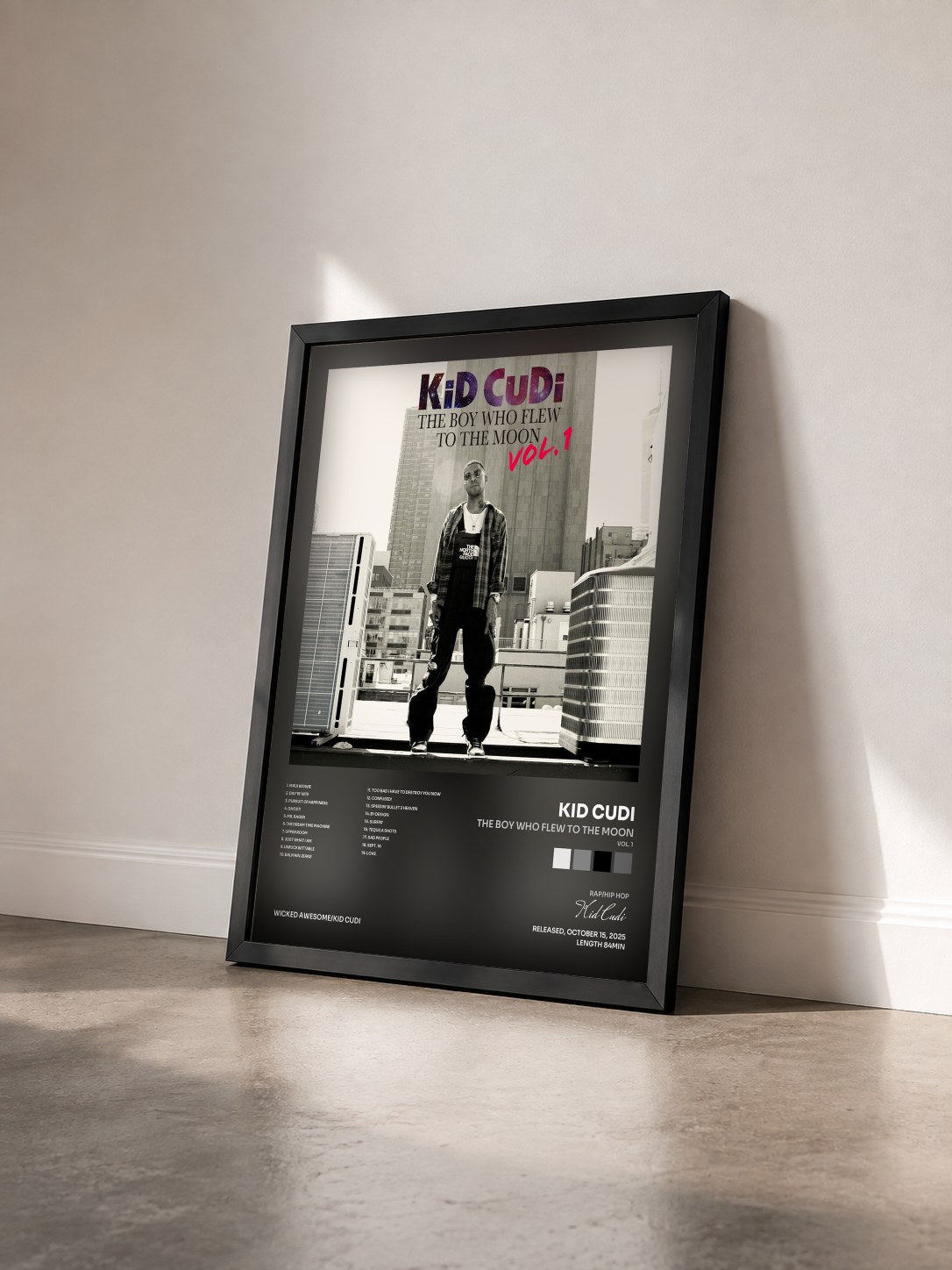 #noir Tableau de l'album The Boy Who Flew To The Moon (Vol. 1) de Kid Cudi vu de trois quarts, cadre noir