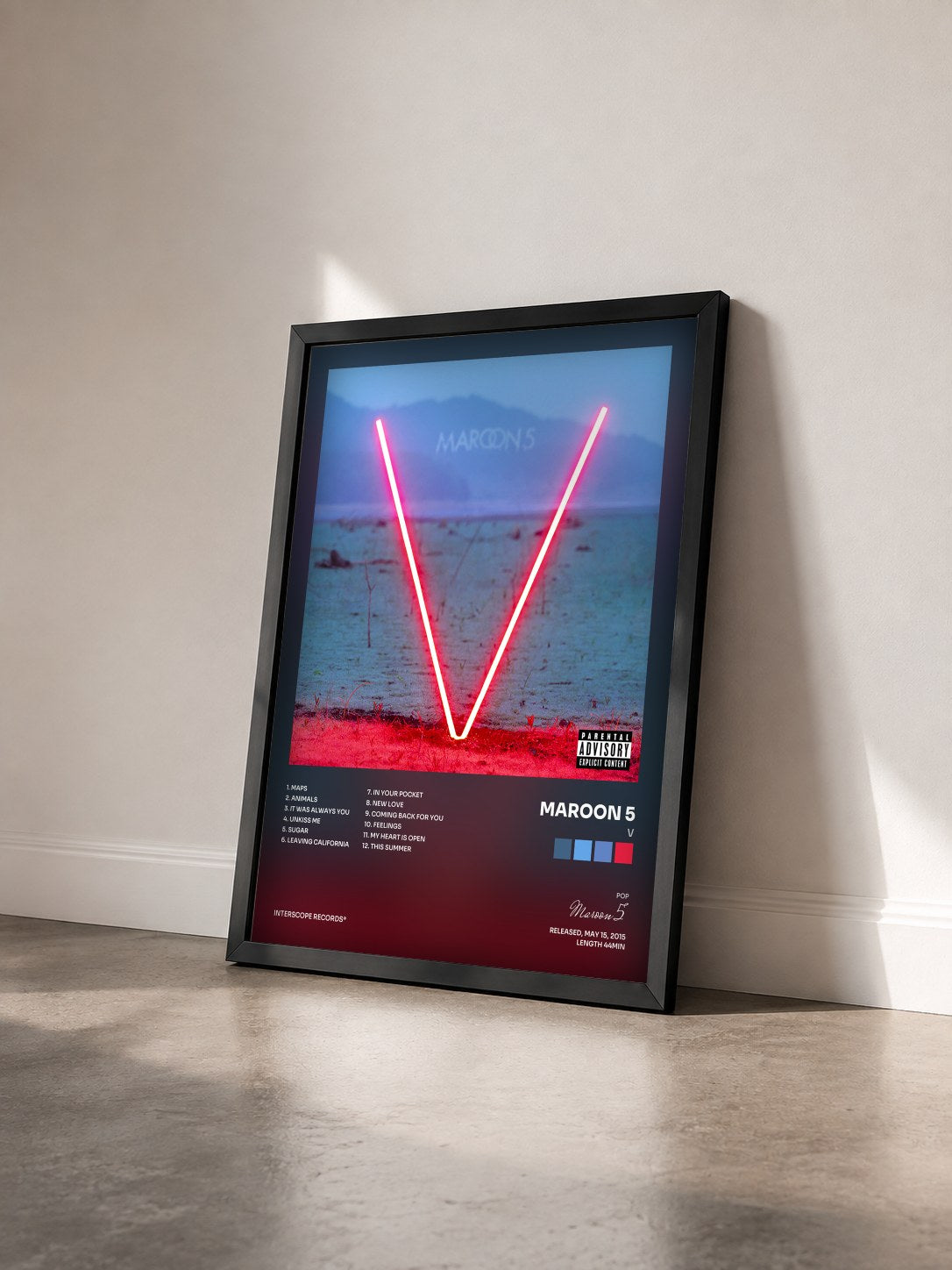 #noir Tableau de l'album V de Maroon 5 vu de trois quarts, cadre noir