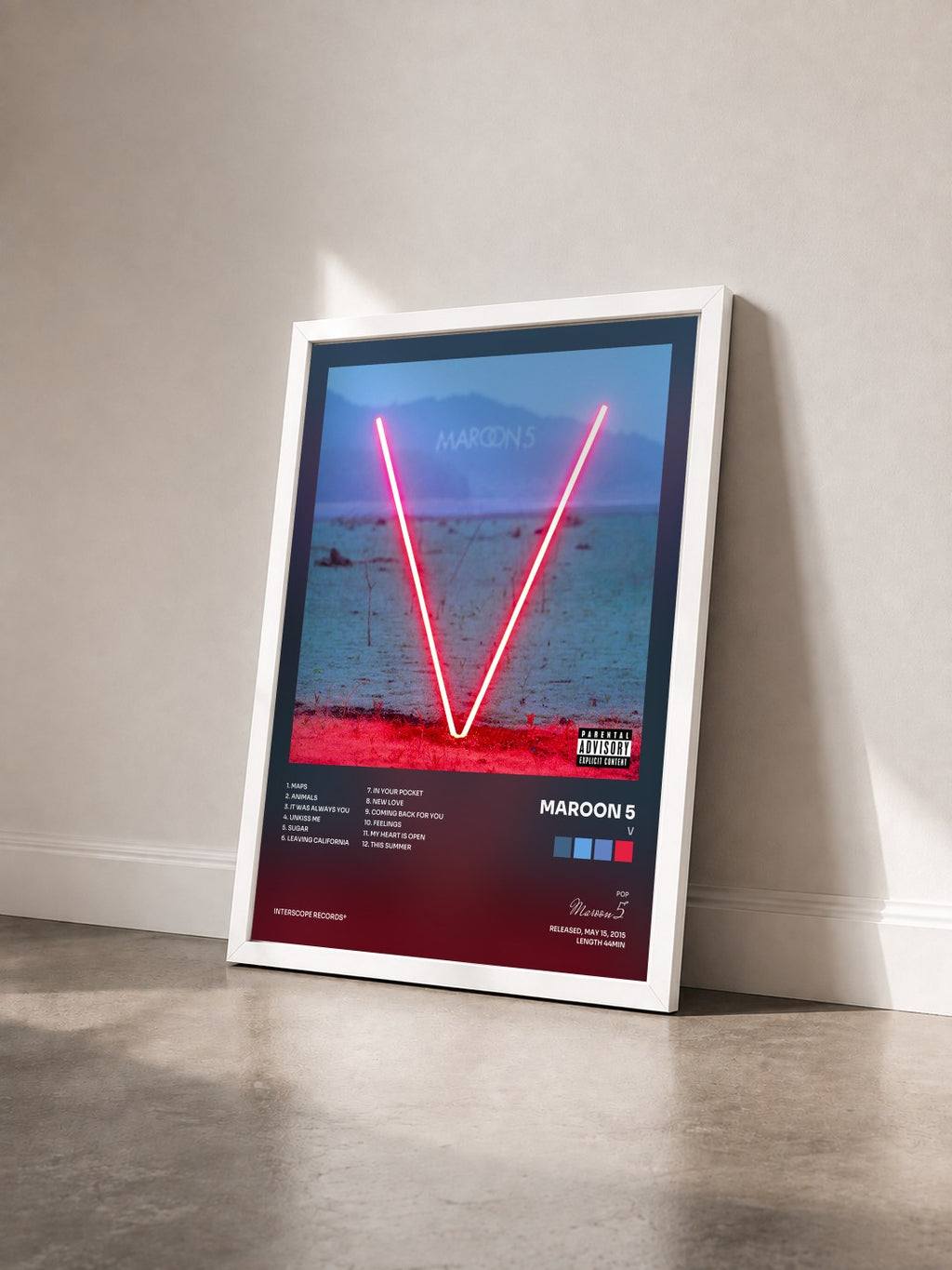 #blanc Tableau de l'album V de Maroon 5 vu de trois quarts, cadre blanc