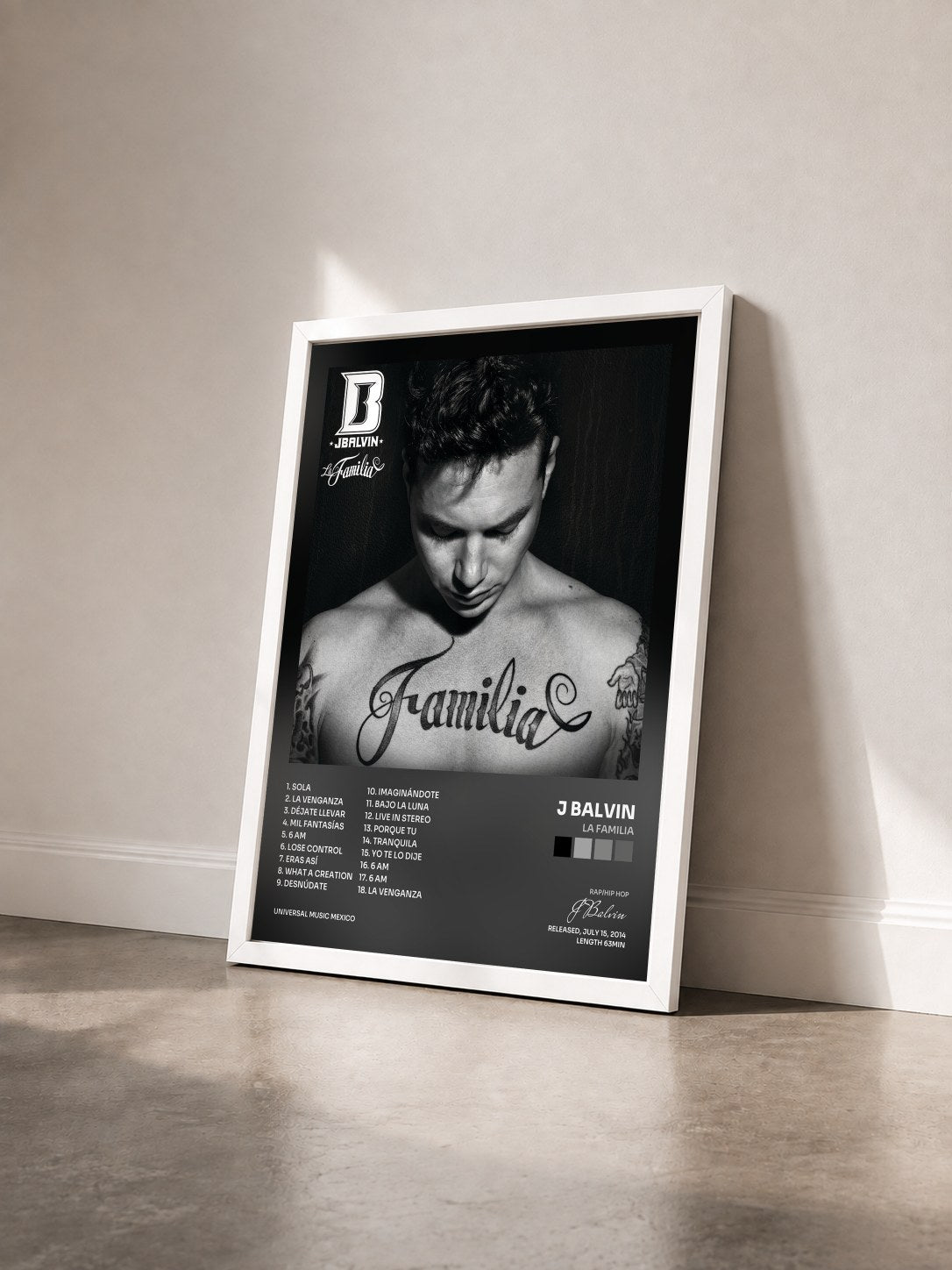 #blanc Tableau de l'album La Familia de J Balvin vu de trois quarts, cadre blanc