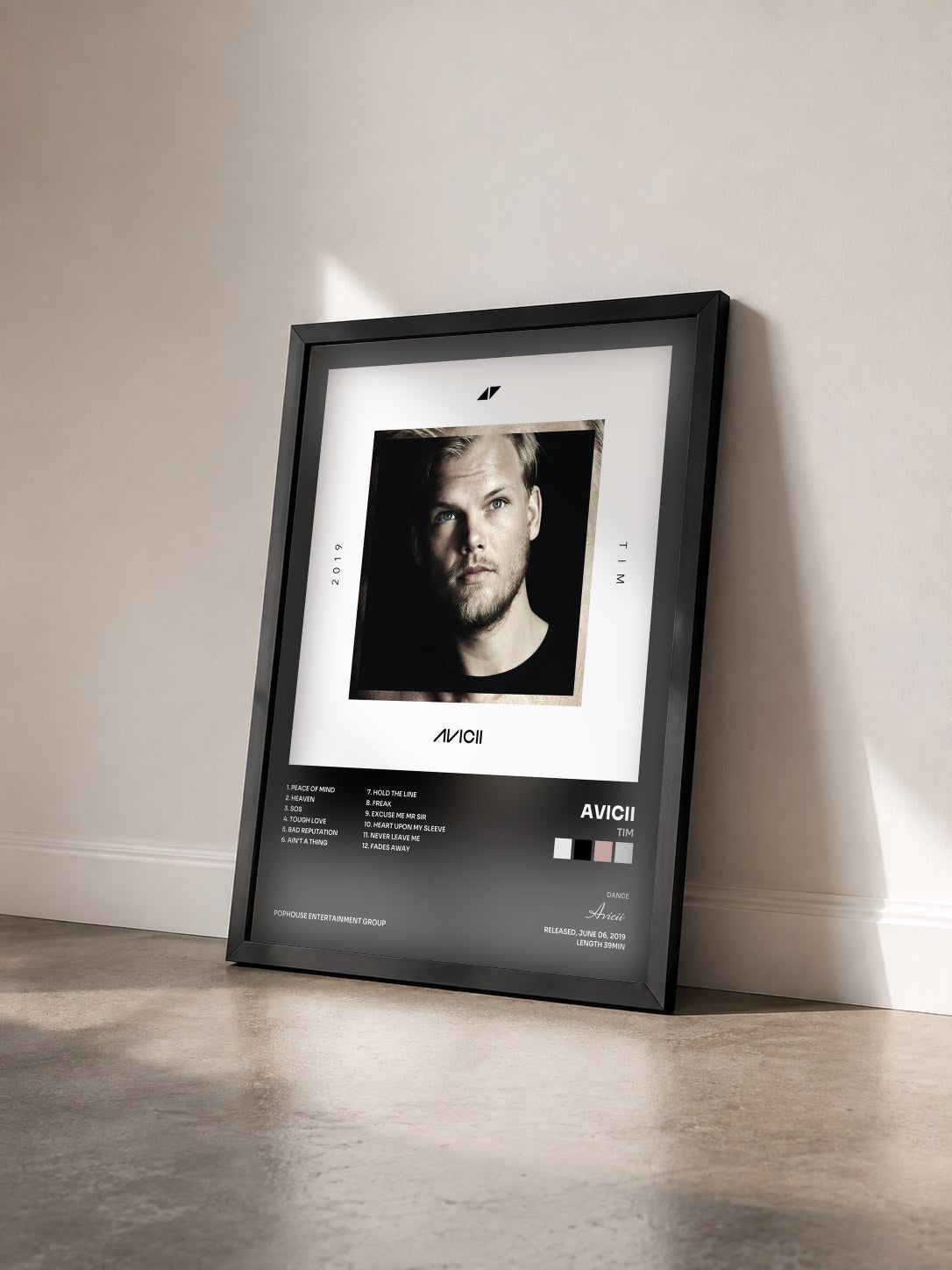 #noir TIM by Avicii as a framed art print seen at an angle, black frame