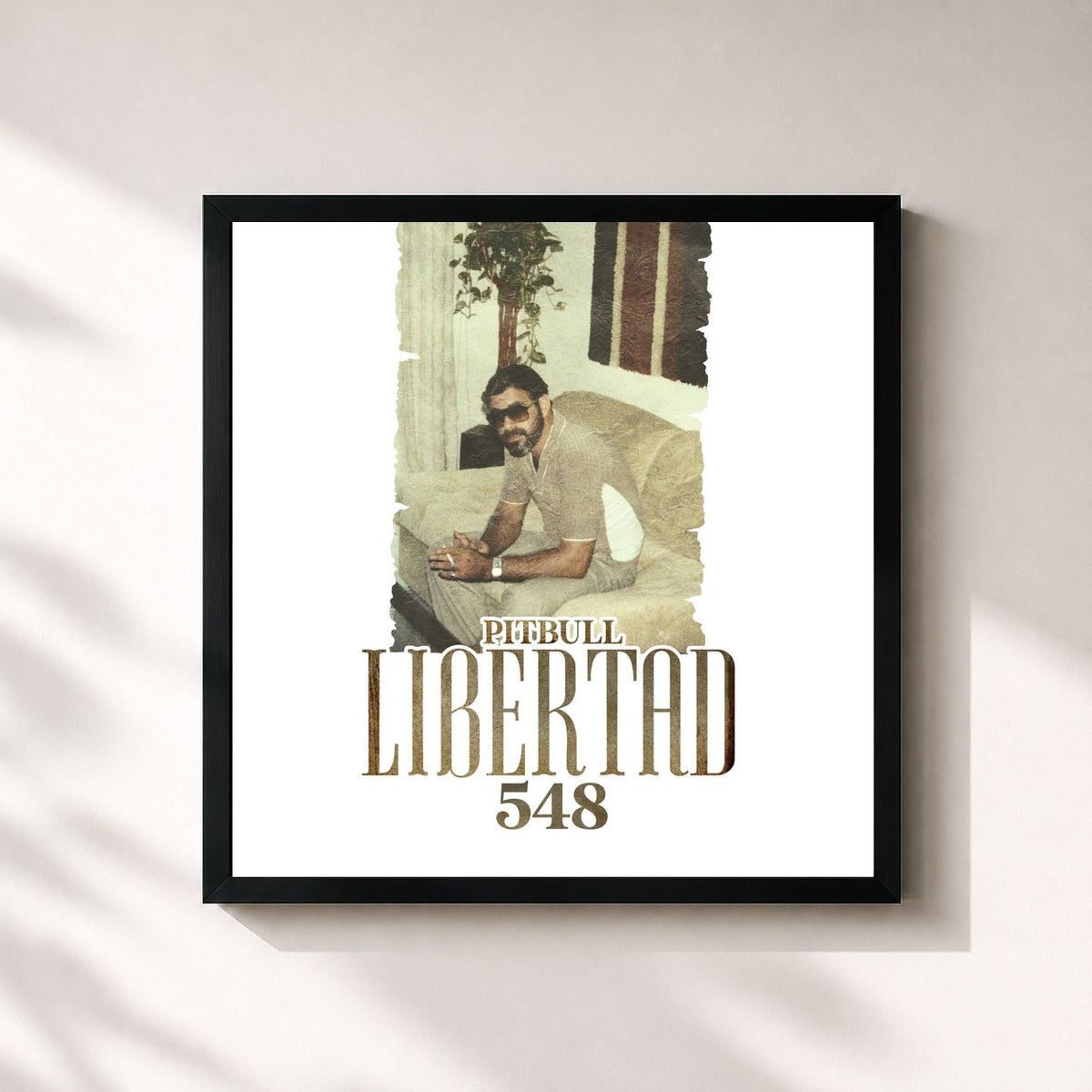 #noir Libertad 548 von Pitbull als quadratischer Kunstdruck, schwarzer Rahmen 32x32 cm