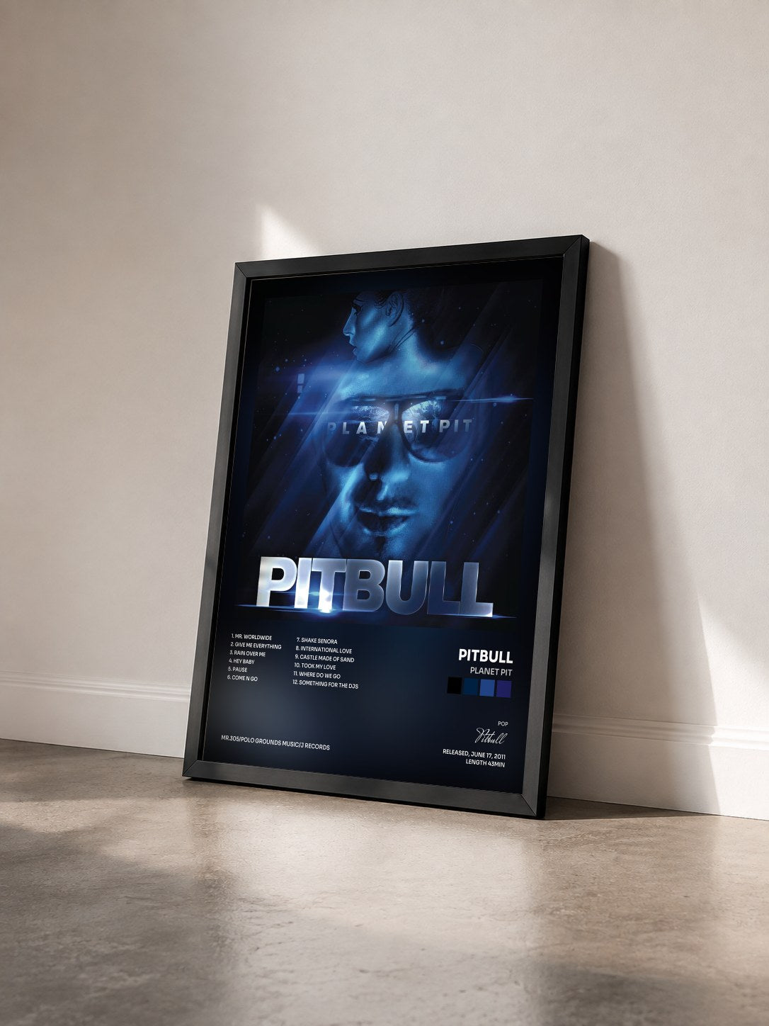 #noir Planet Pit by Pitbull as a framed art print seen at an angle, black frame