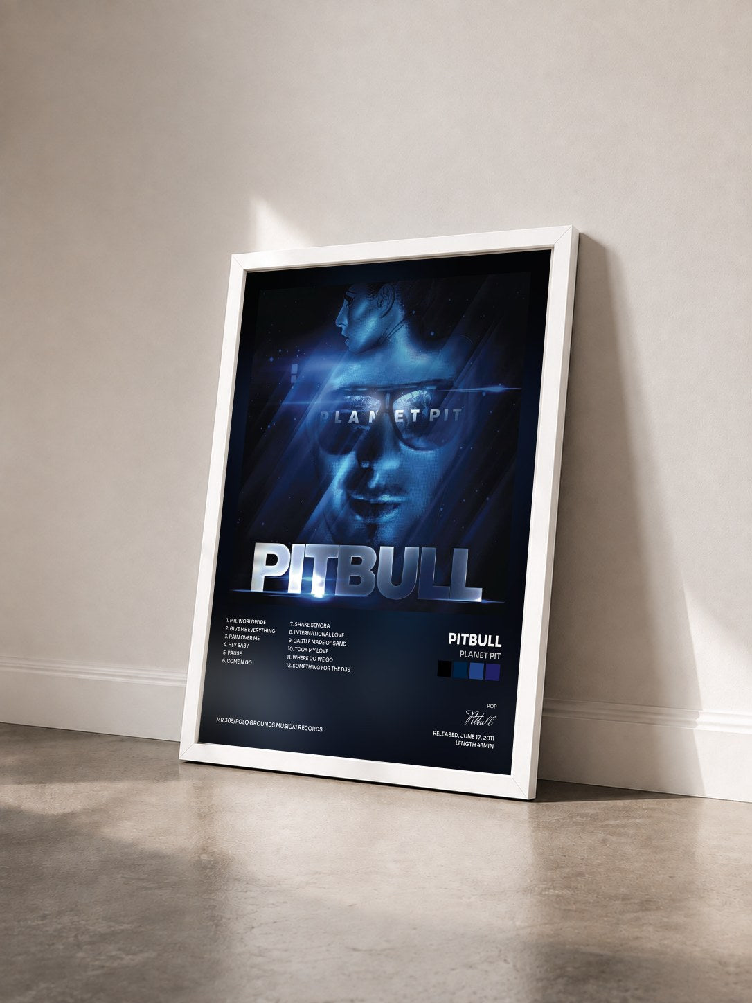 #blanc Planet Pit by Pitbull as a framed art print seen at an angle, white frame