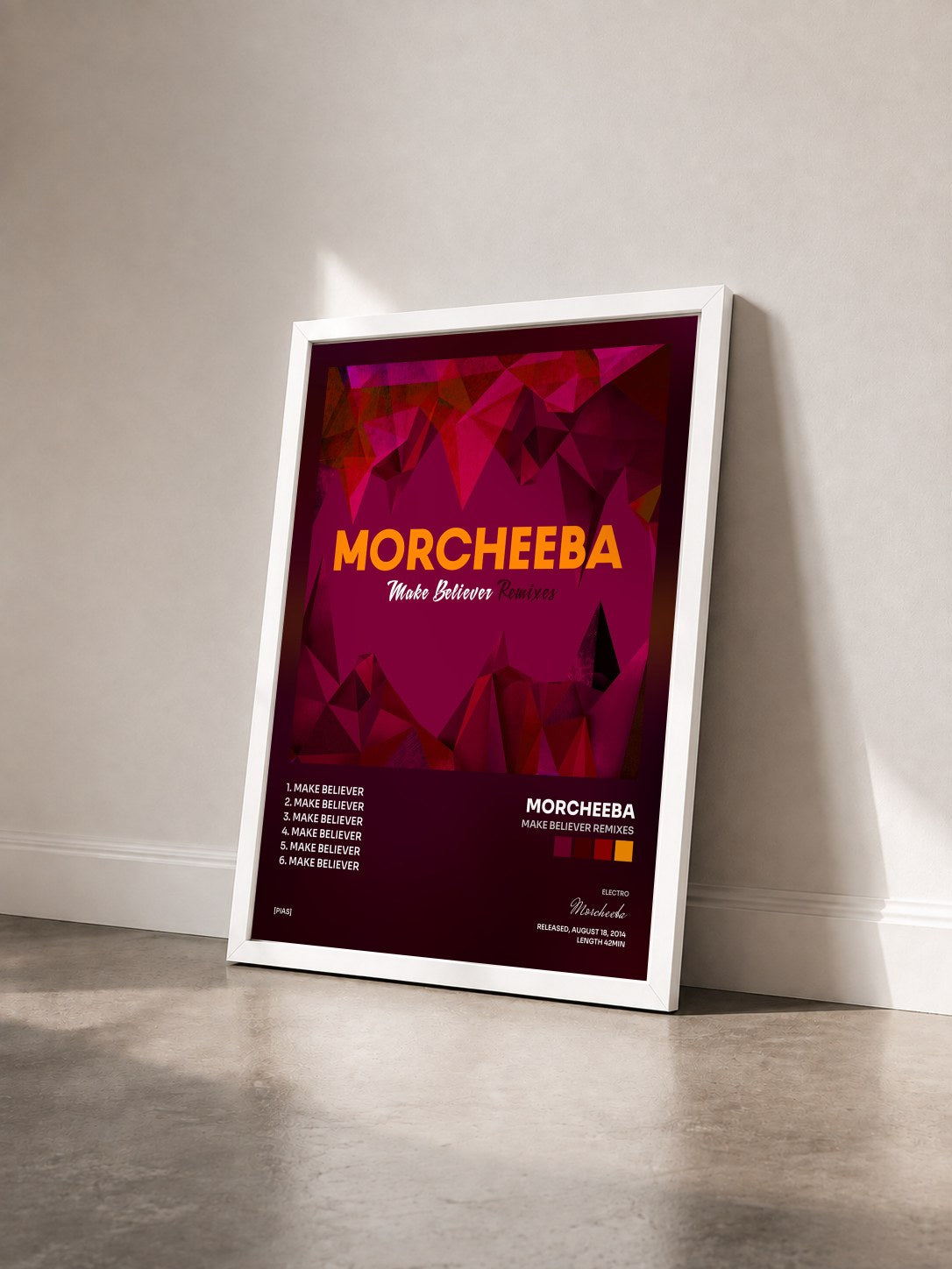 #blanc Tableau de l'album Make Believer Remixes de Morcheeba vu de trois quarts, cadre blanc
