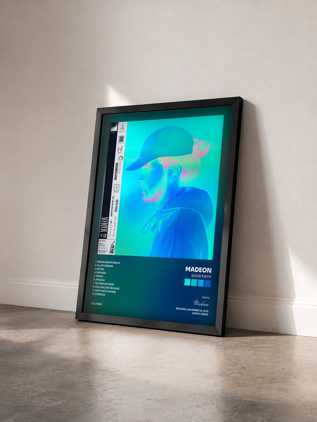 #noir Tableau de l'album Good Faith de Madeon vu de trois quarts, cadre noir