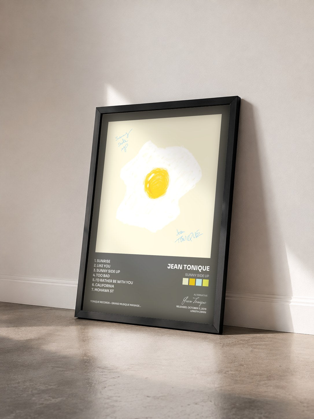 #noir sunny side up by Jean Tonique as a framed art print seen at an angle, black frame