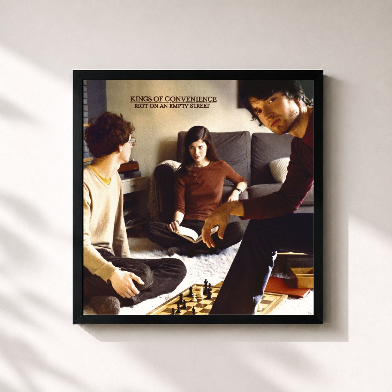 #noir Tableau carré de l'album Riot On An Empty Street de Kings of Convenience, cadre noir 32x32 cm