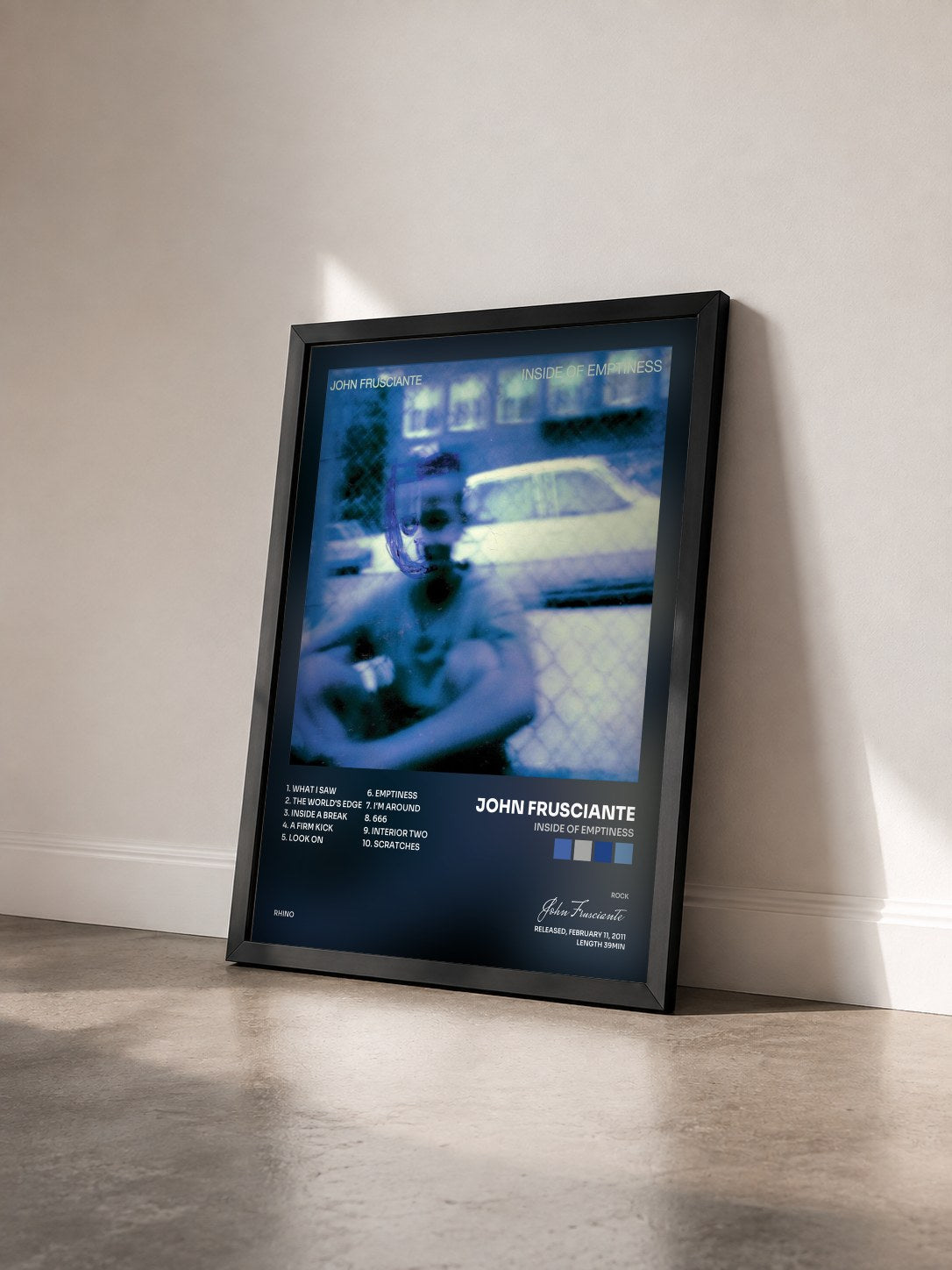 #noir Inside of Emptiness by John Frusciante as a framed art print seen at an angle, black frame