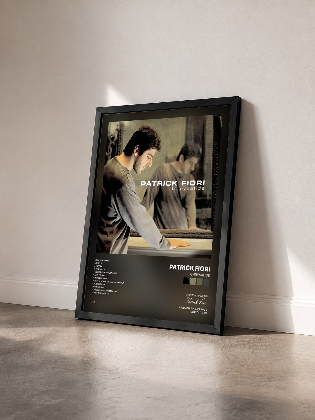 #noir Tableau de l'album Chrysalide de Patrick Fiori vu de trois quarts, cadre noir