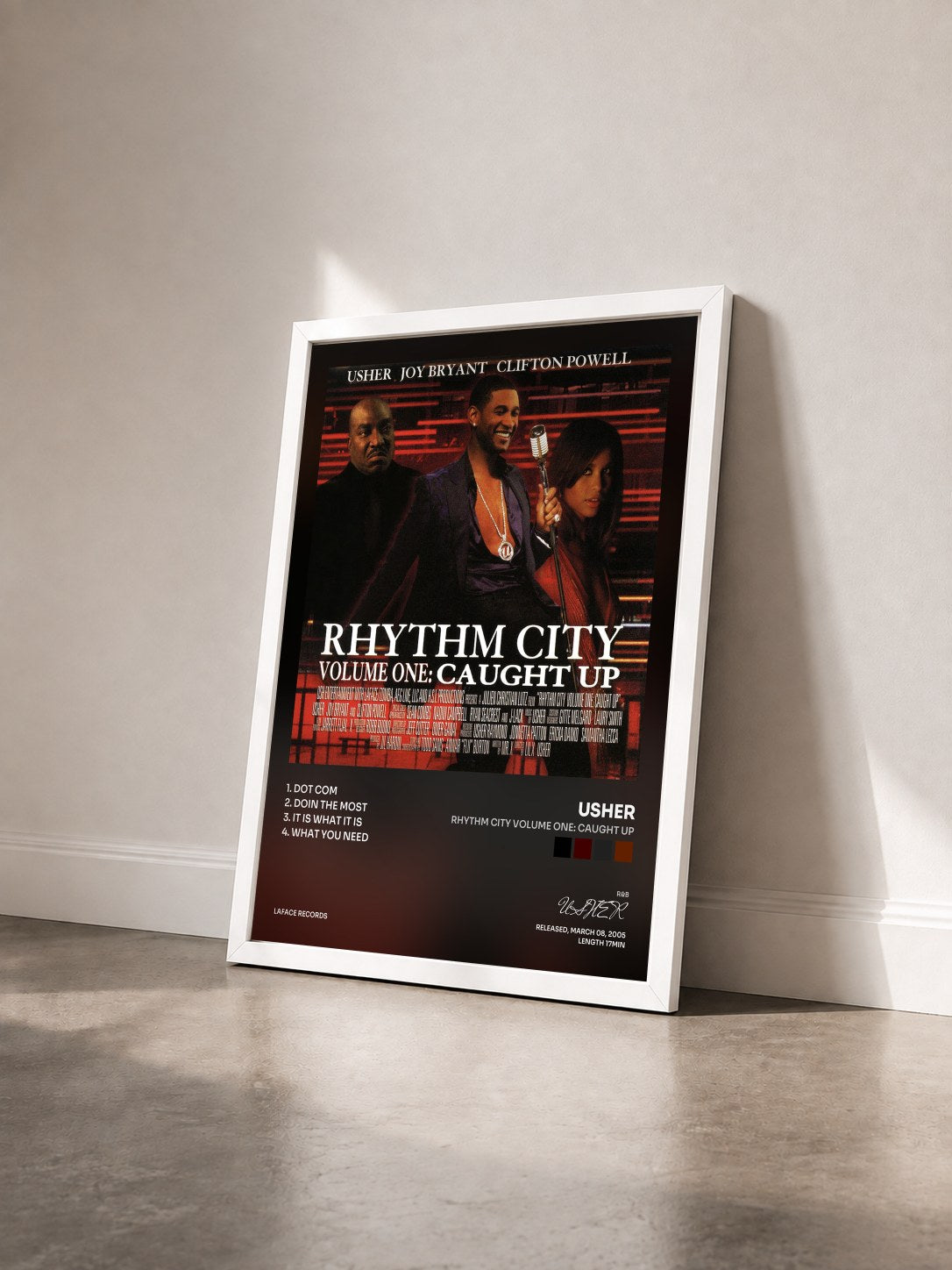 #blanc Tableau de l'album Rhythm City Volume One: Caught Up de USHER vu de trois quarts, cadre blanc