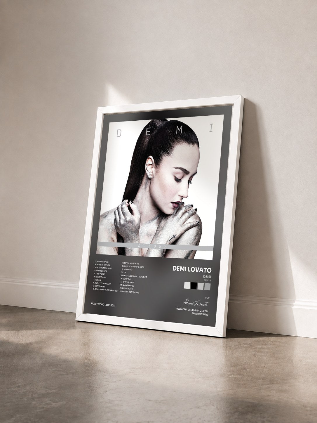 #blanc Demi (Deluxe) by Demi Lovato as a framed art print seen at an angle, white frame