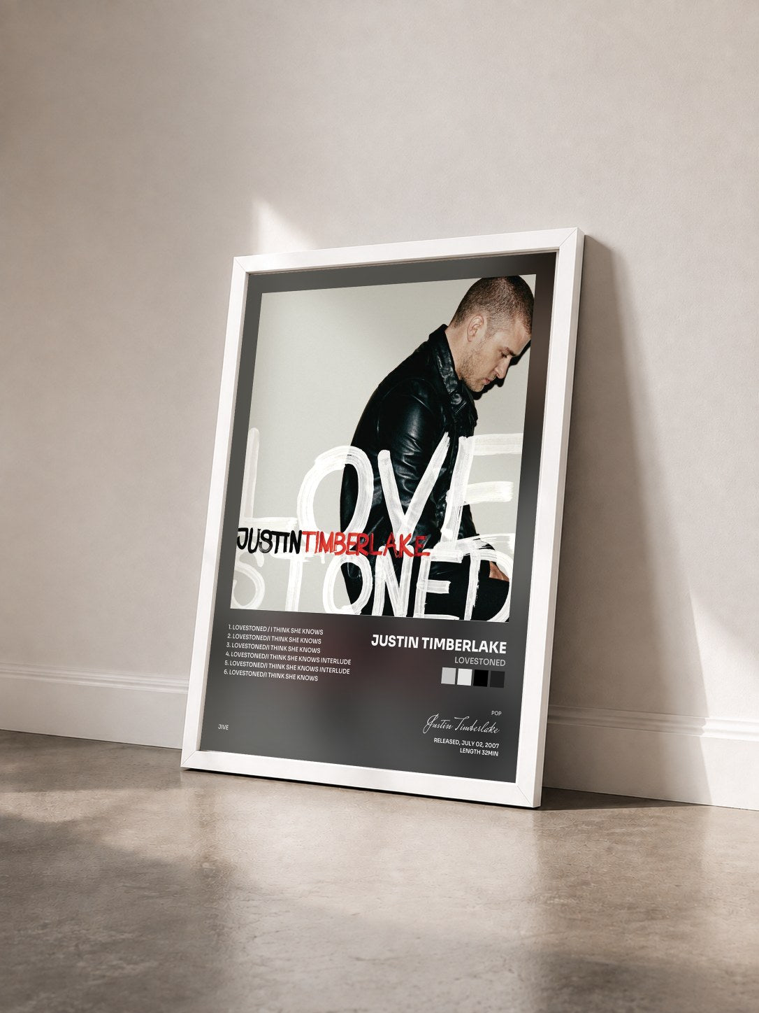 #blanc Tableau de l'album LoveStoned de Justin Timberlake vu de trois quarts, cadre blanc