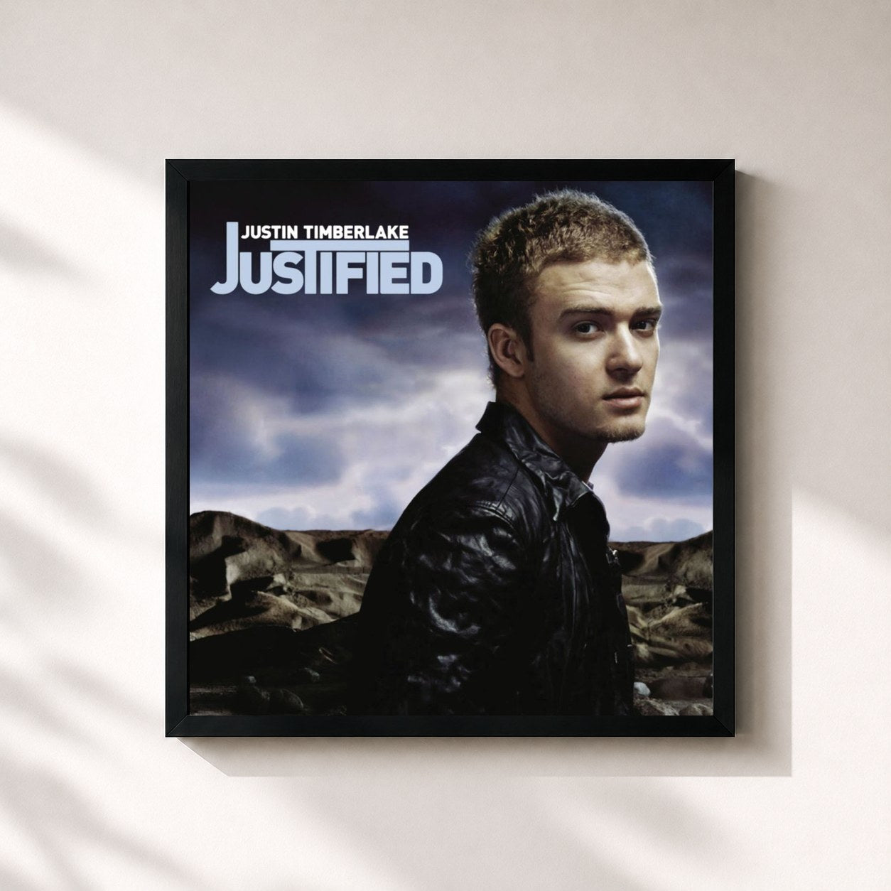 #noir Justified by Justin Timberlake as a square framed art print, black 32x32 cm frame