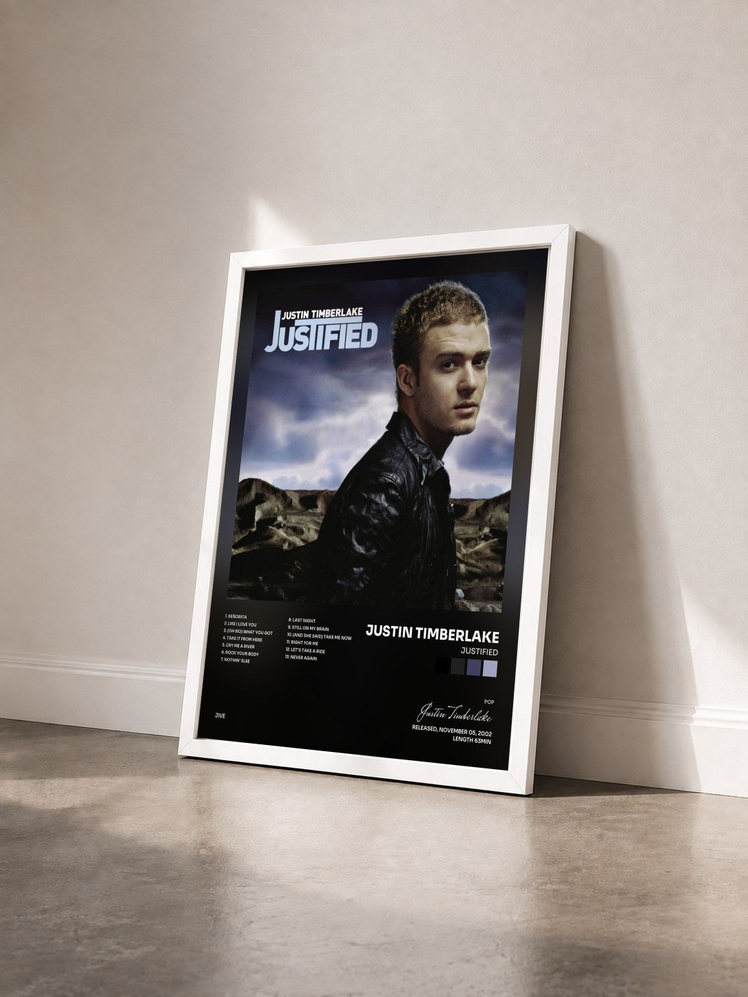 #blanc Justified by Justin Timberlake as a framed art print seen at an angle, white frame