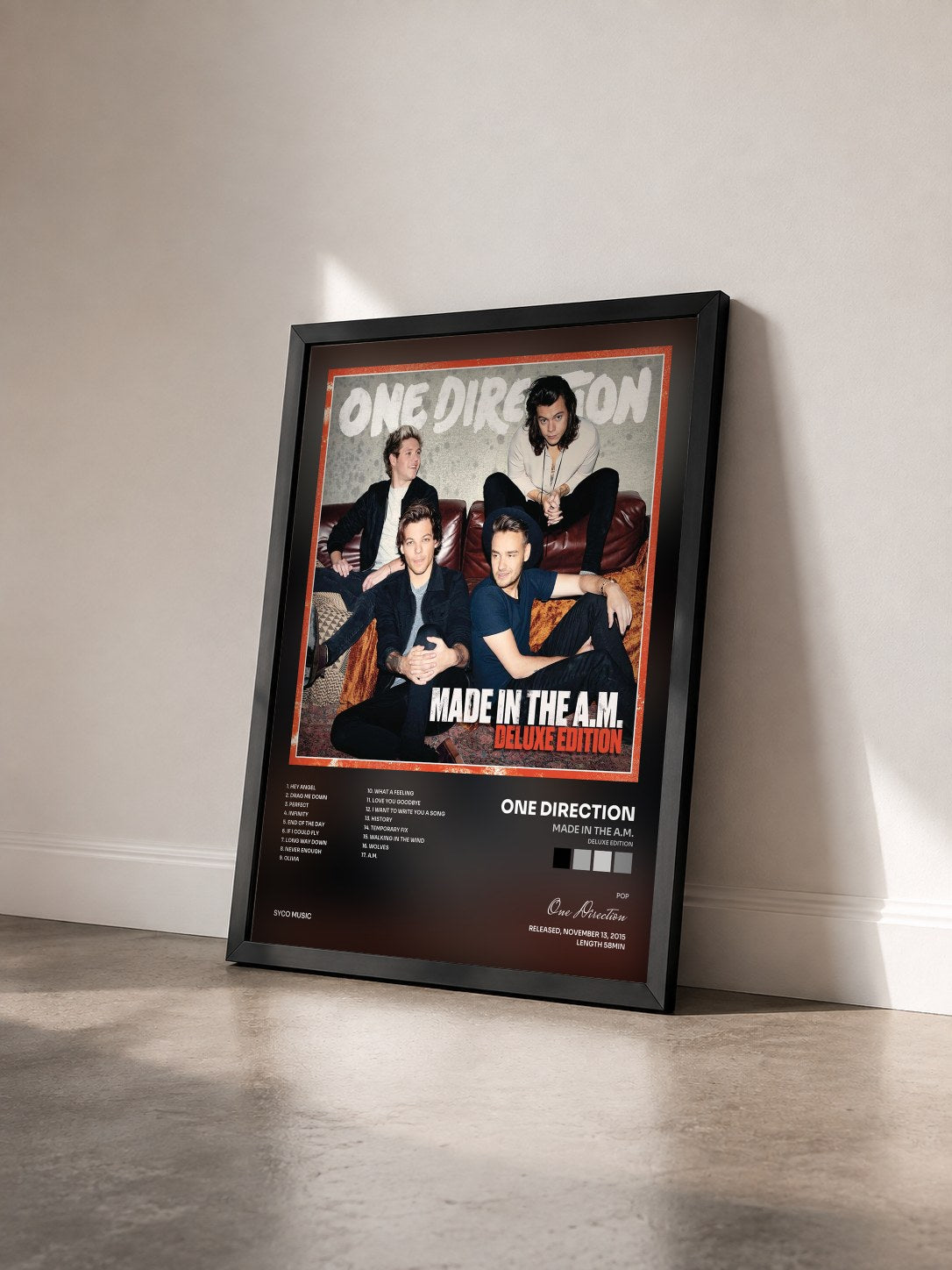 #noir Made In The A.M. (Deluxe Edition) di One Direction in stampa incorniciata vista di tre quarti, cornice nera