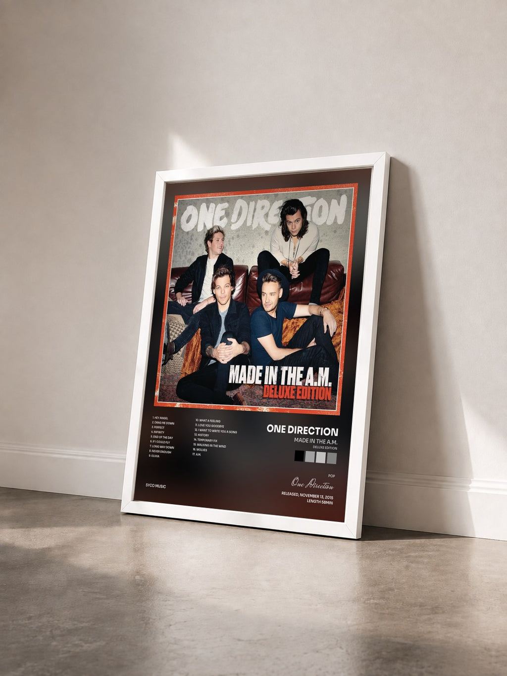 #blanc Tableau de l'album Made In The A.M. (Deluxe Edition) de One Direction vu de trois quarts, cadre blanc