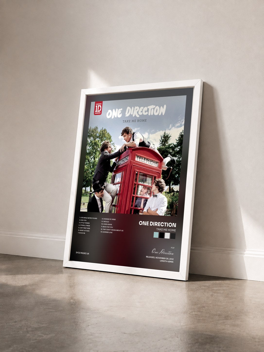 #blanc Take Me Home di One Direction in stampa incorniciata vista di tre quarti, cornice bianca