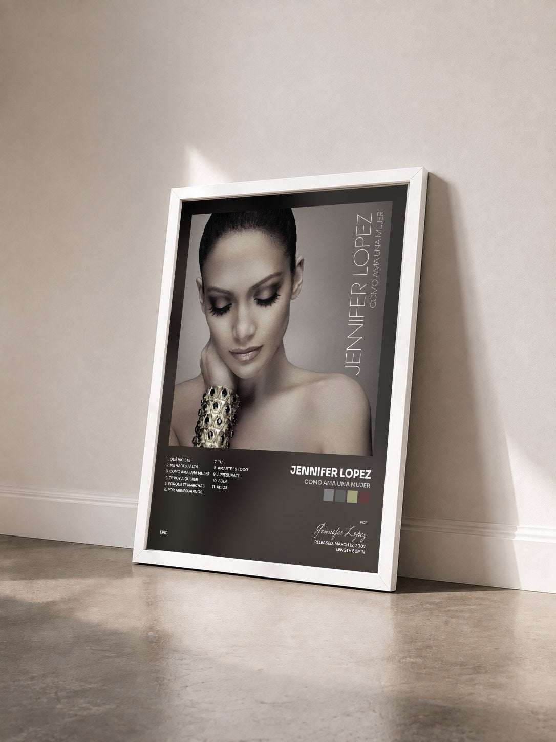 #blanc Tableau de l'album Como Ama Una Mujer de Jennifer Lopez vu de trois quarts, cadre blanc