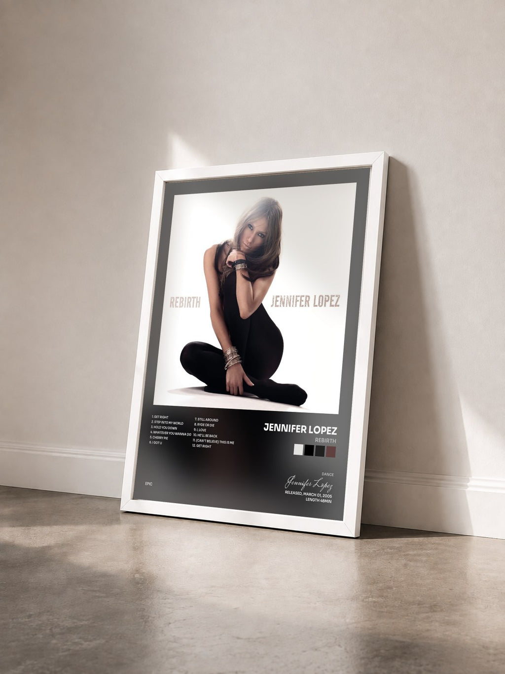 #blanc Tableau de l'album Rebirth de Jennifer Lopez vu de trois quarts, cadre blanc