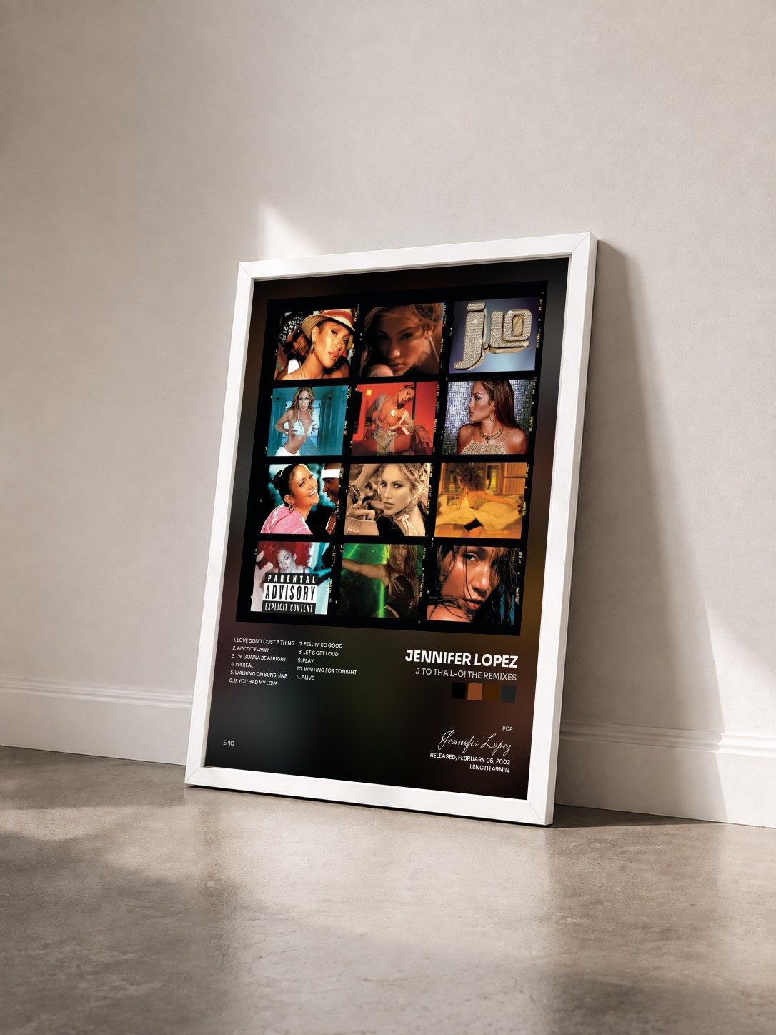 #blanc Tableau de l'album J To Tha L-O! The Remixes de Jennifer Lopez vu de trois quarts, cadre blanc
