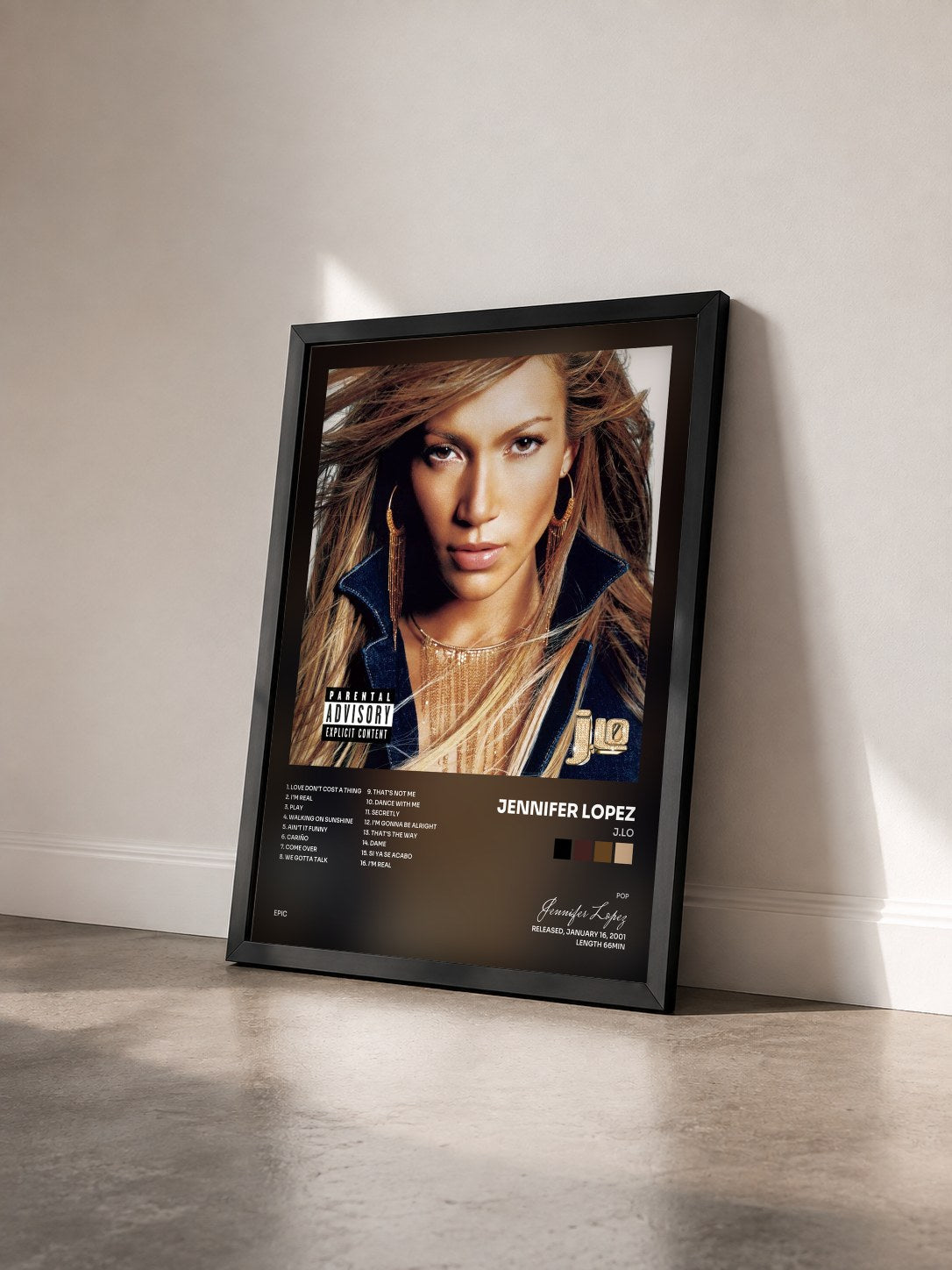 #noir Tableau de l'album J.Lo de Jennifer Lopez vu de trois quarts, cadre noir