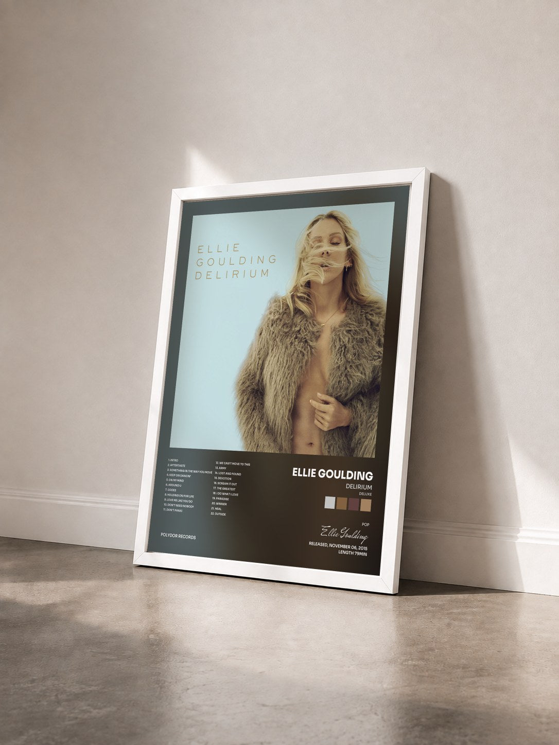 #blanc Tableau de l'album Delirium (Deluxe) de Ellie Goulding vu de trois quarts, cadre blanc