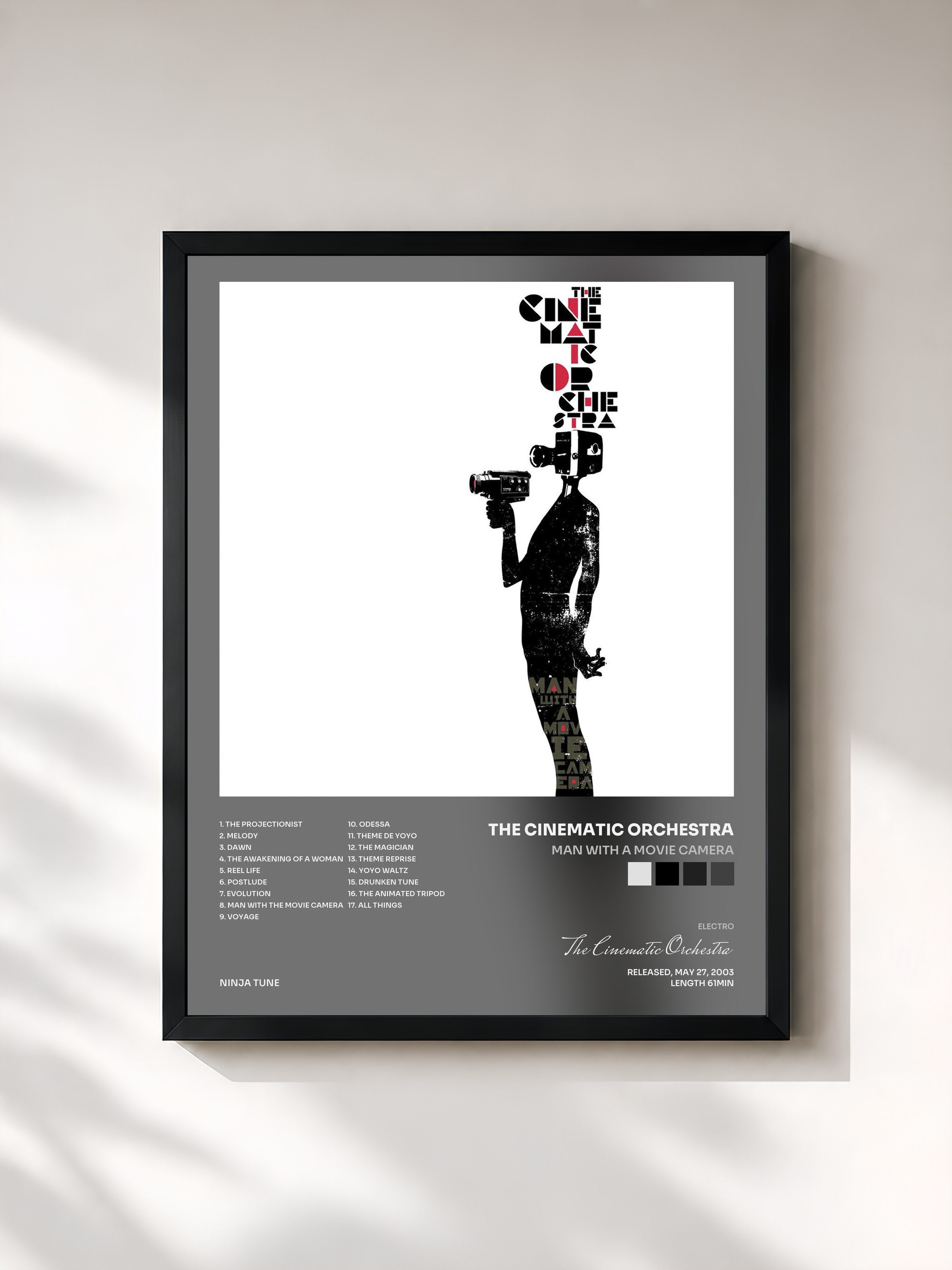#noir Tableau de l'album Man With A Movie Camera de The Cinematic Orchestra, cadre noir, imprimé et encadré en France