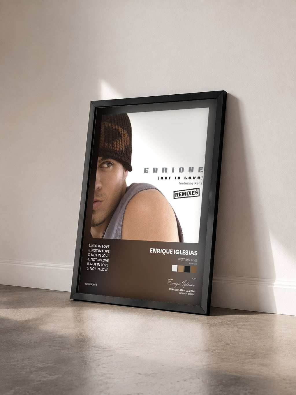 #noir Tableau de l'album Not In Love (Remixes) de Enrique Iglesias vu de trois quarts, cadre noir