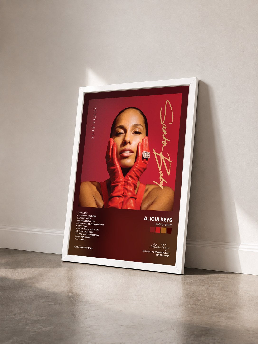 #blanc Tableau de l'album Santa Baby de Alicia Keys vu de trois quarts, cadre blanc